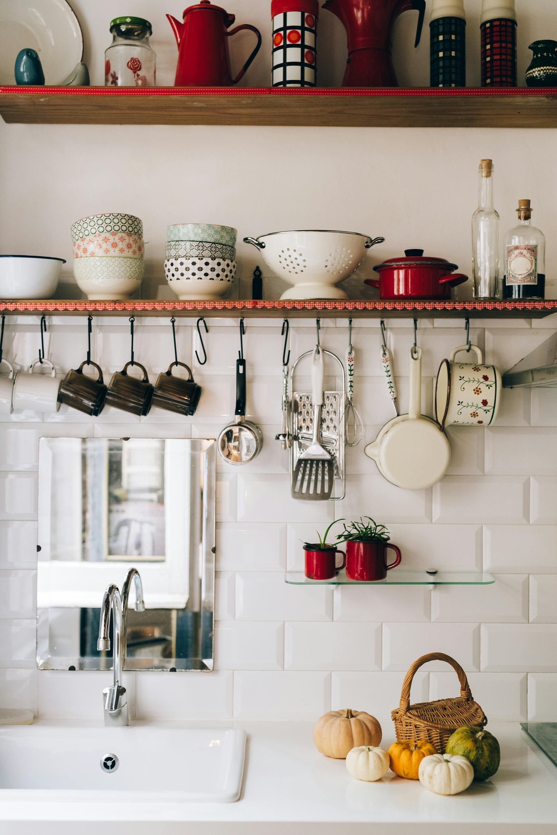 Kitchen utensils on the shelves | Source: Pexels