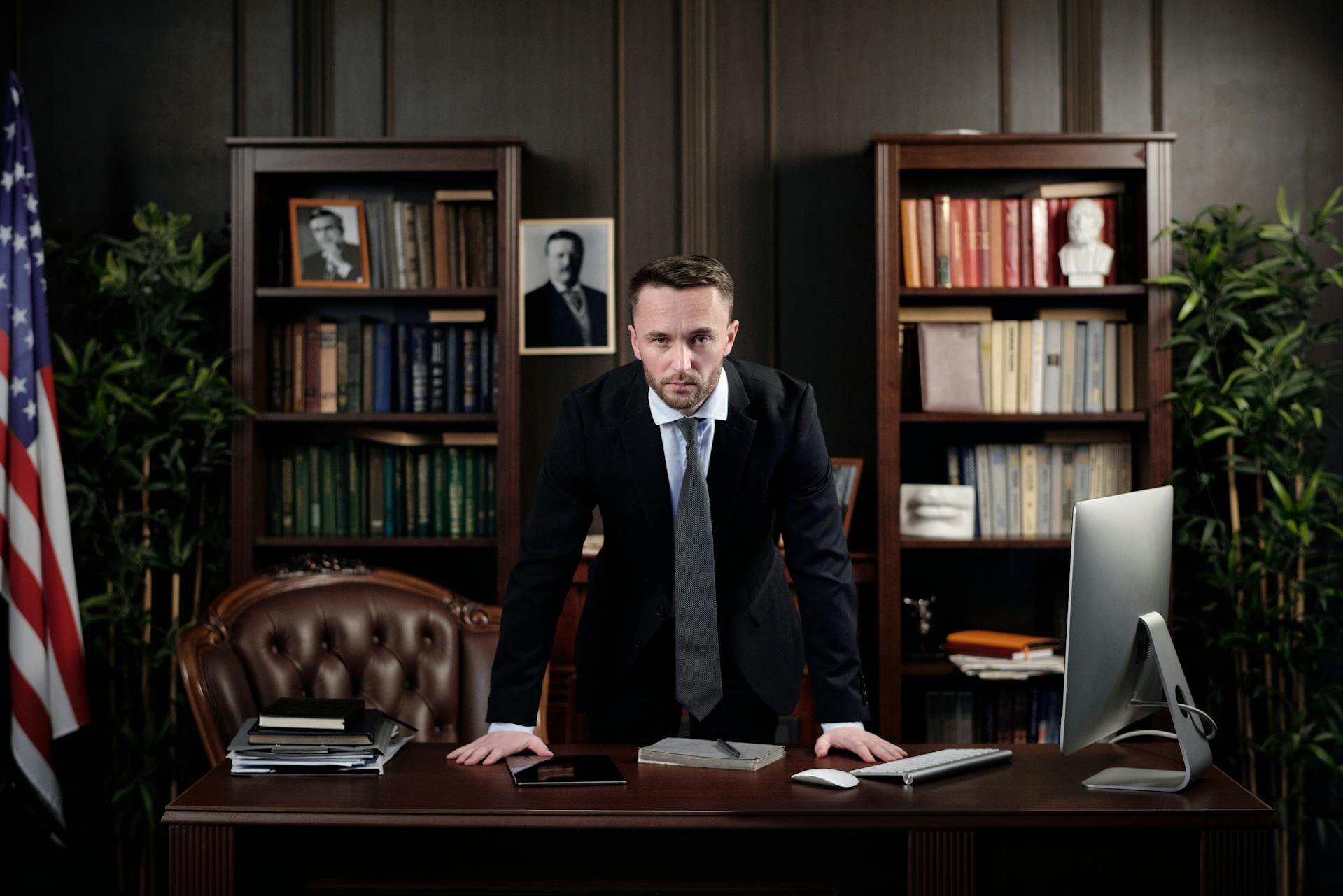 A lawyer leaning on his desk, looking frustrated | Source: Pexels