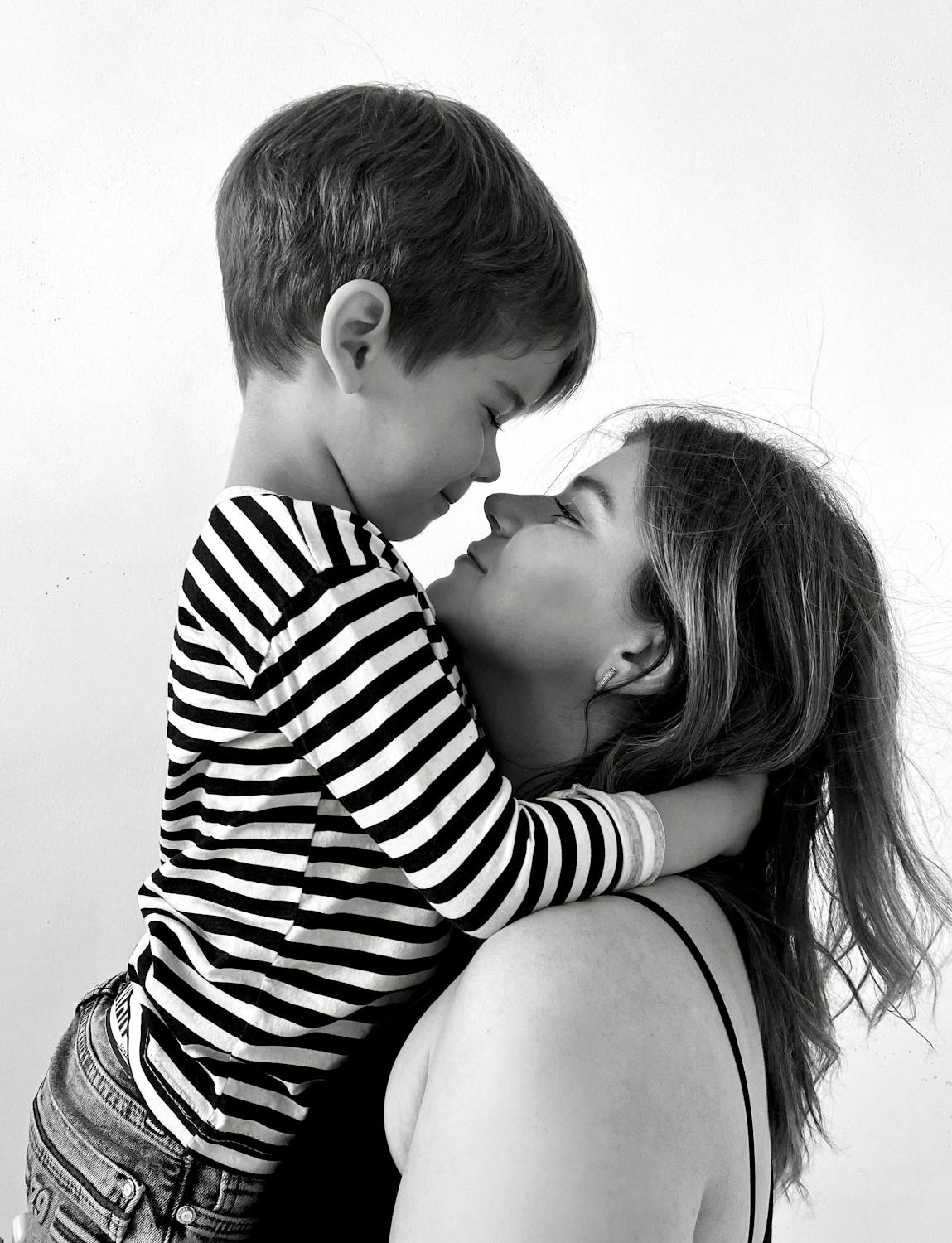 A woman hugging her son | Source: Pexels