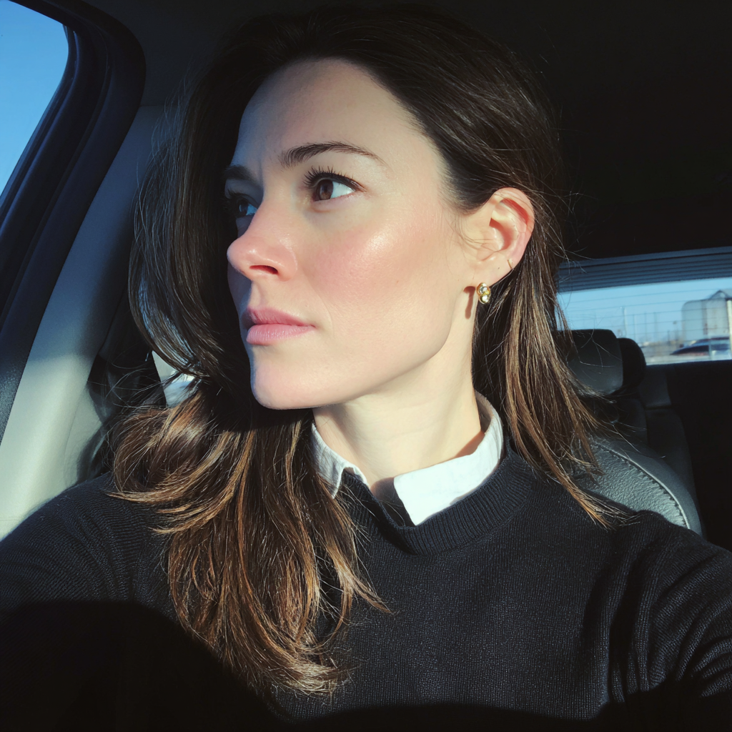 A woman driving a car | Source: Midjourney