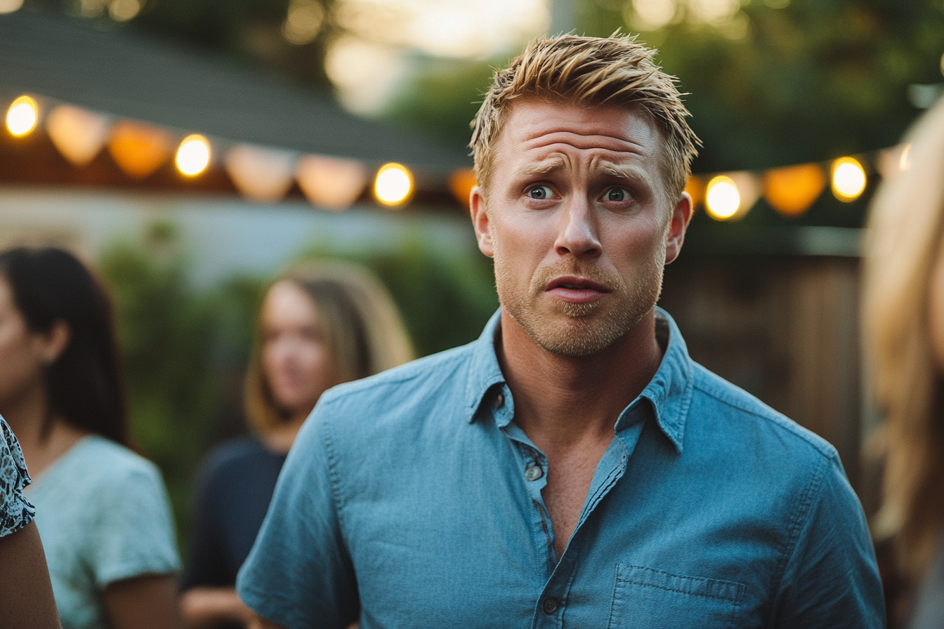 Worried man at a backyard birthday party | Source: Midjourney