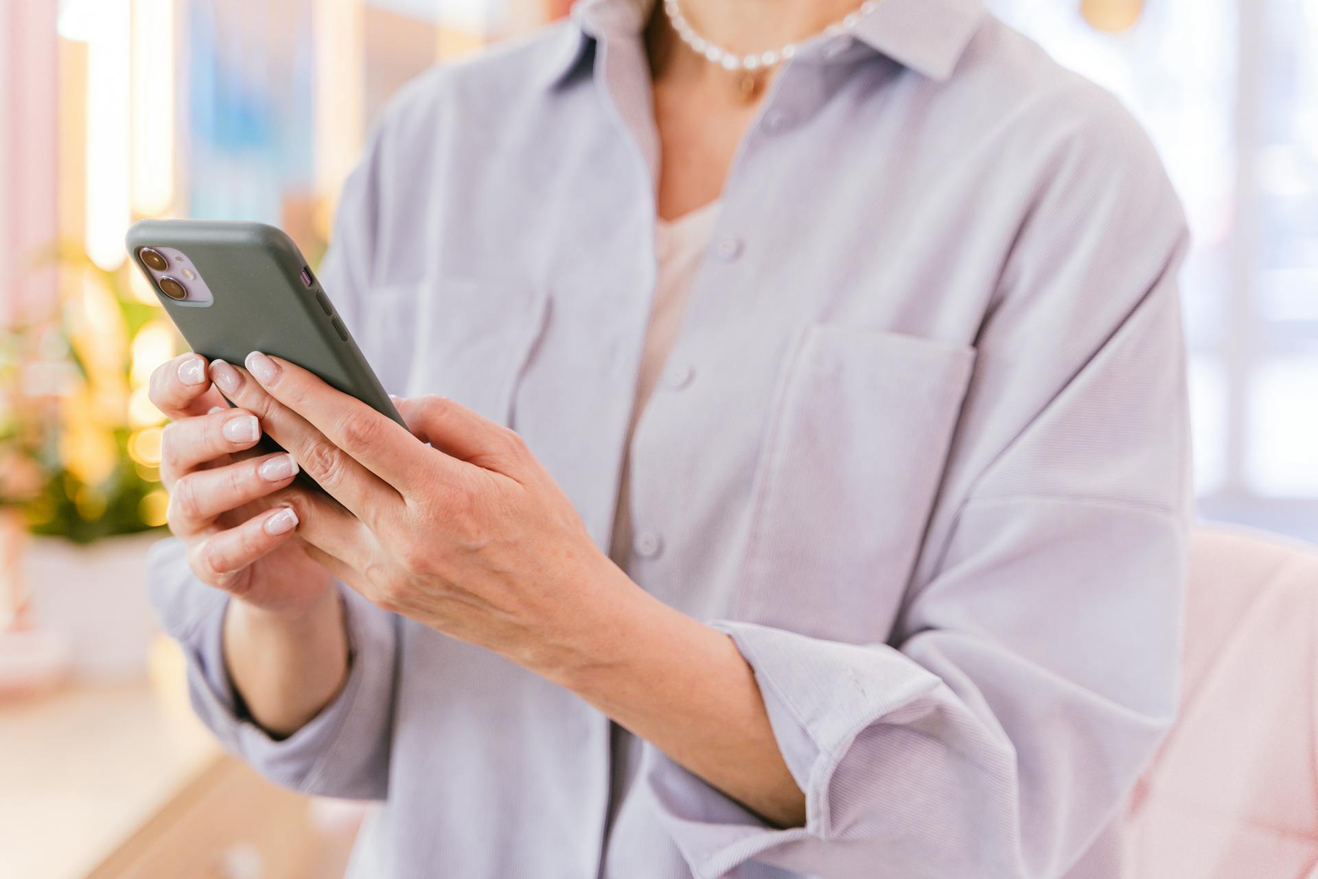A close-up shot of a woman looking at her phone | Source: Pexels