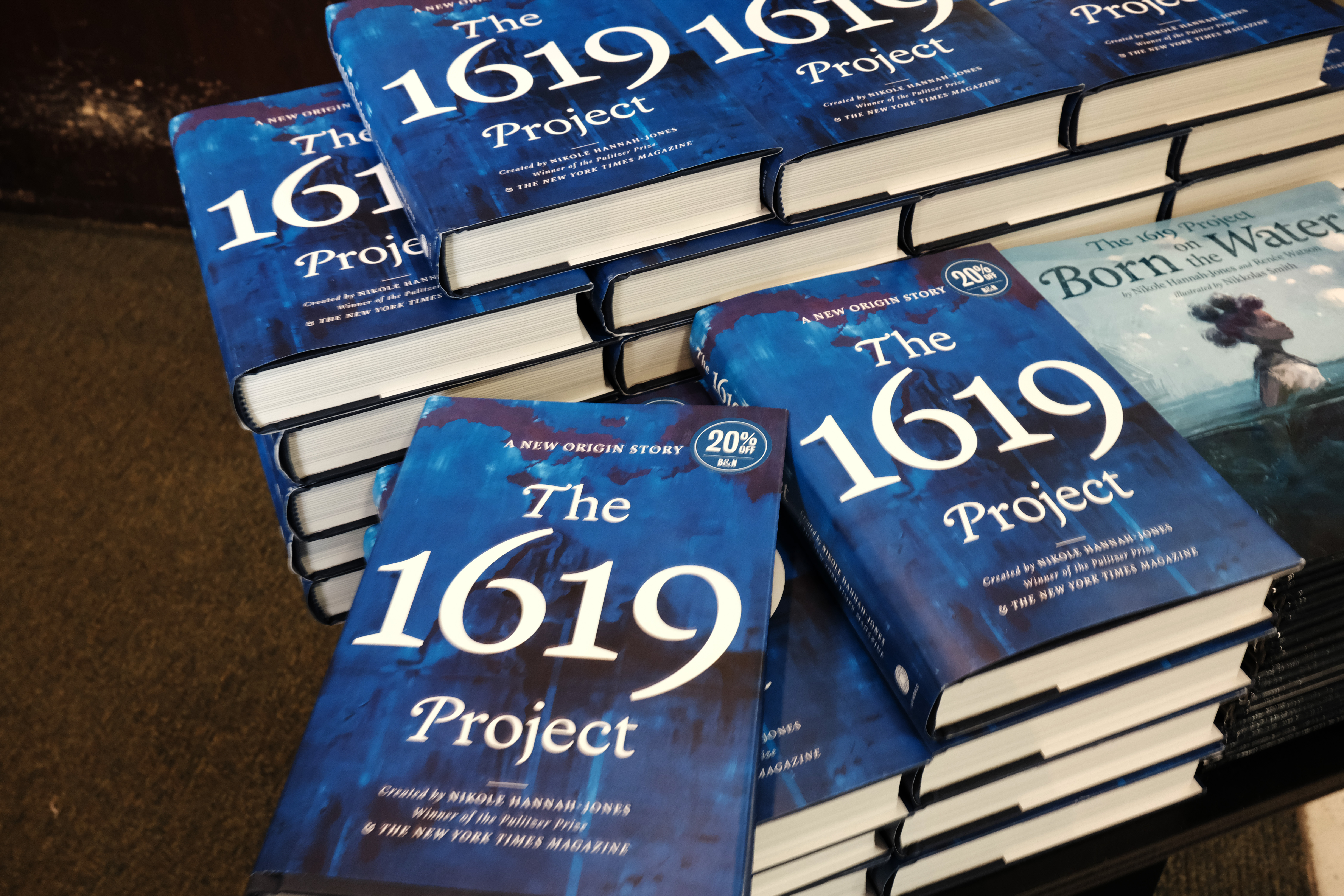 "The 1619 Project: A New Origin Story" is displayed at a New York City bookstore on November 17, 2021 in New York City. | Source: Getty Images