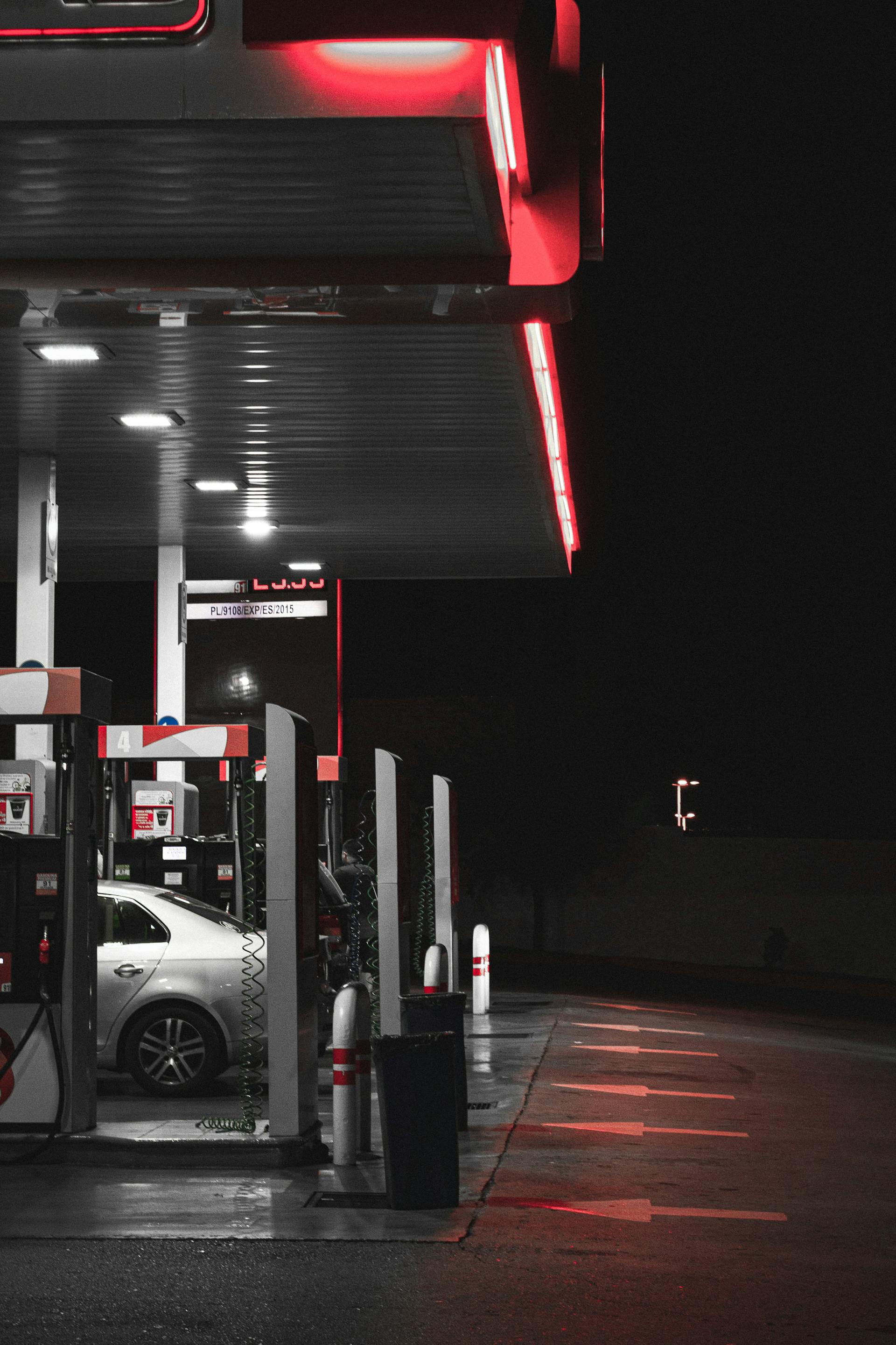 A car parked beside a gas pump | Source: Pexels