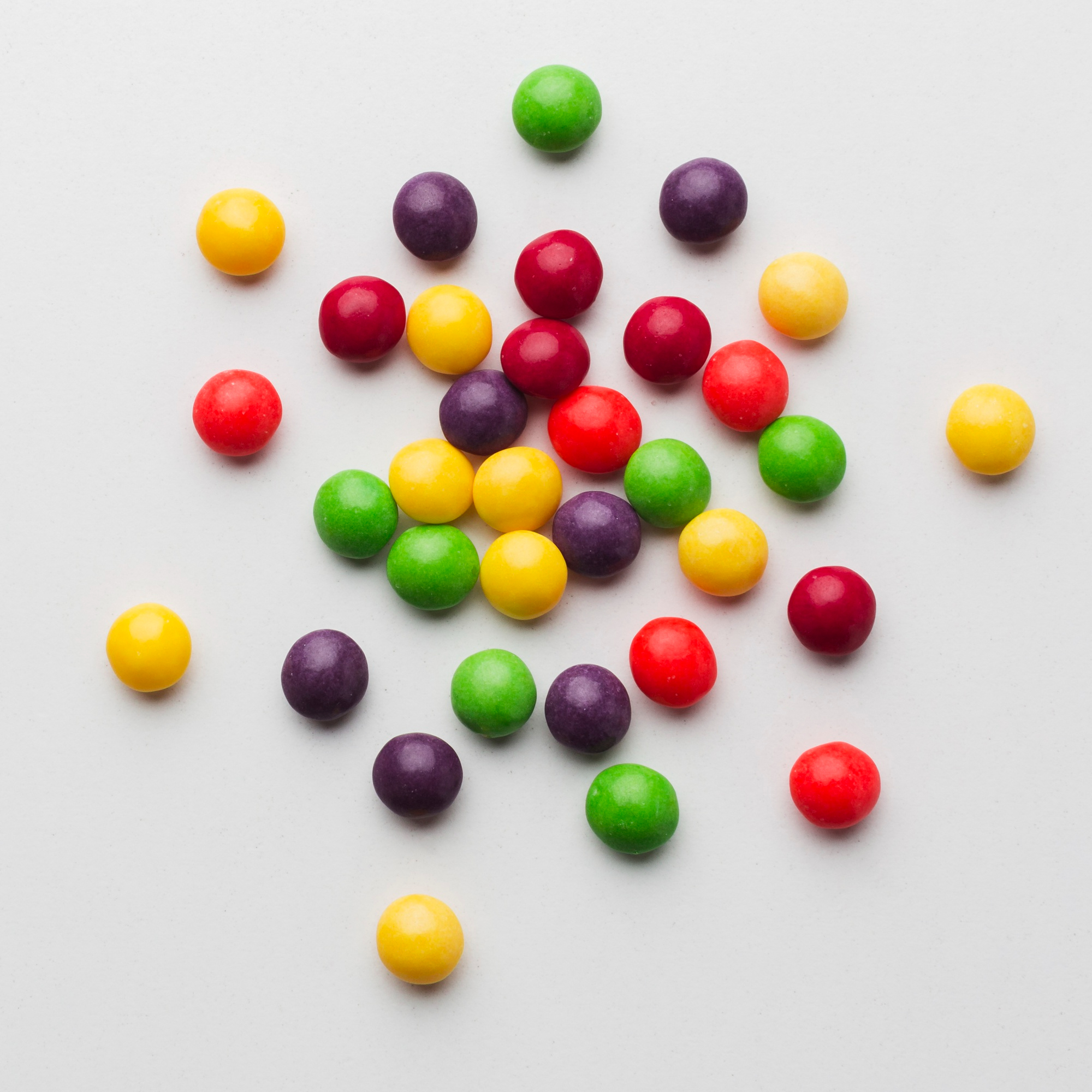Skittles on a white background | Source: Freepik