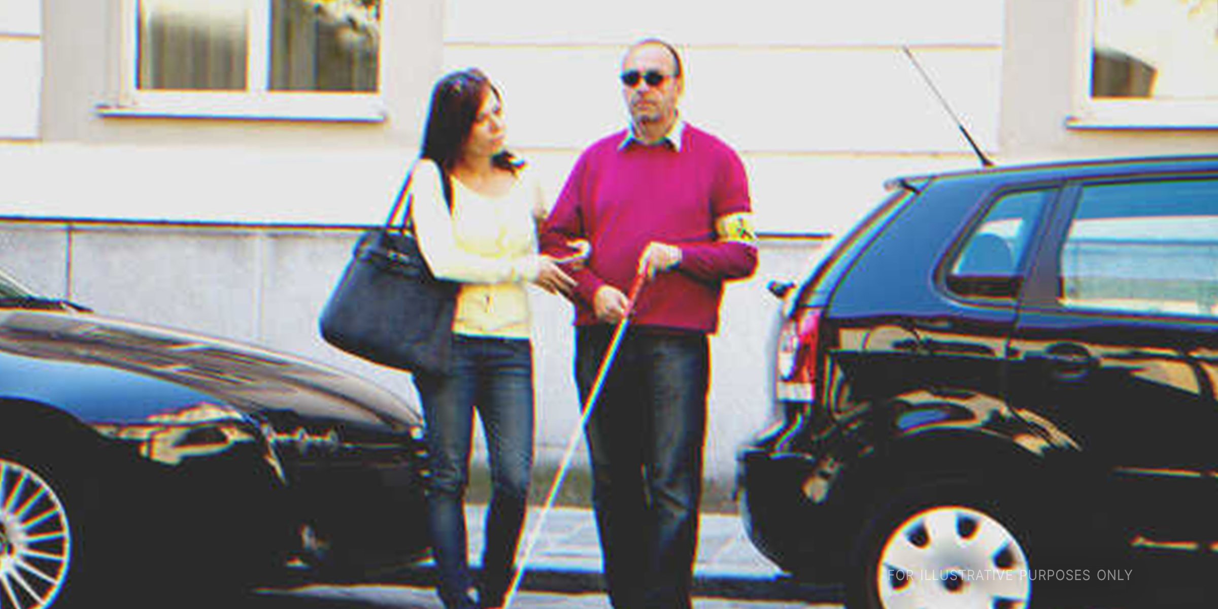 Young woman guiding blind man | Source: Shutterstock