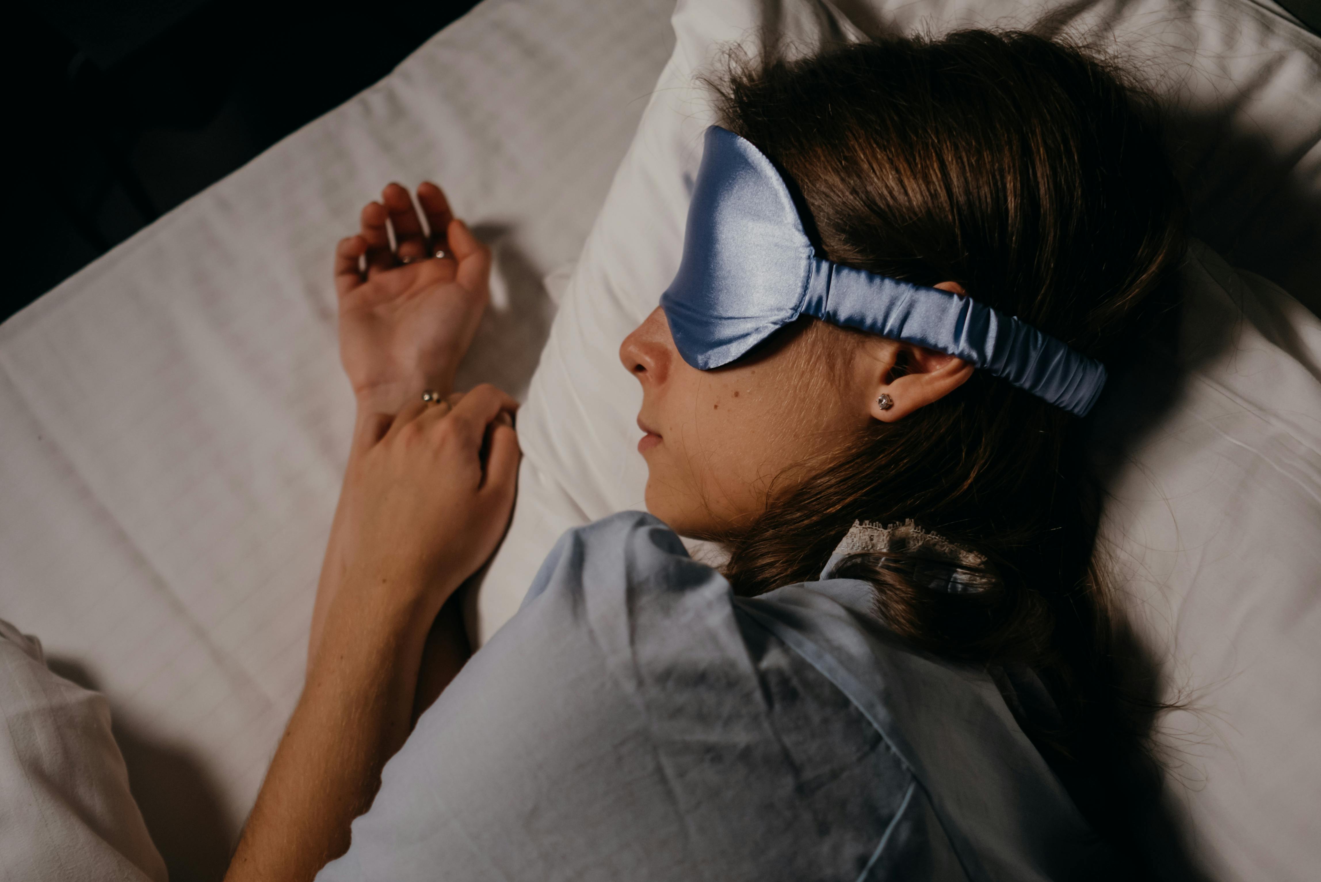 A woman laying in bed | Source: Pexels