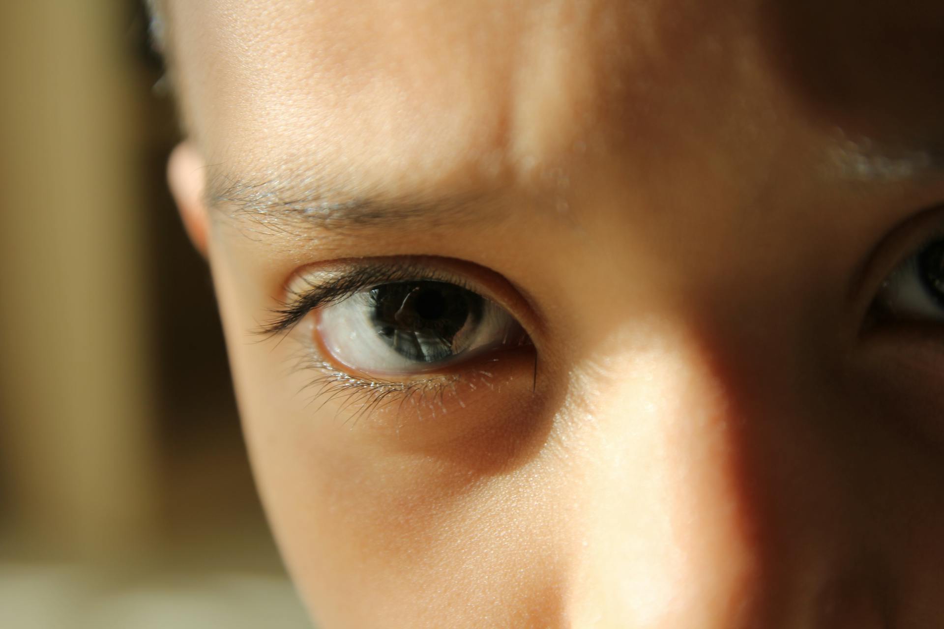 Close up of a boy's emotive eyes | Source: Pexels