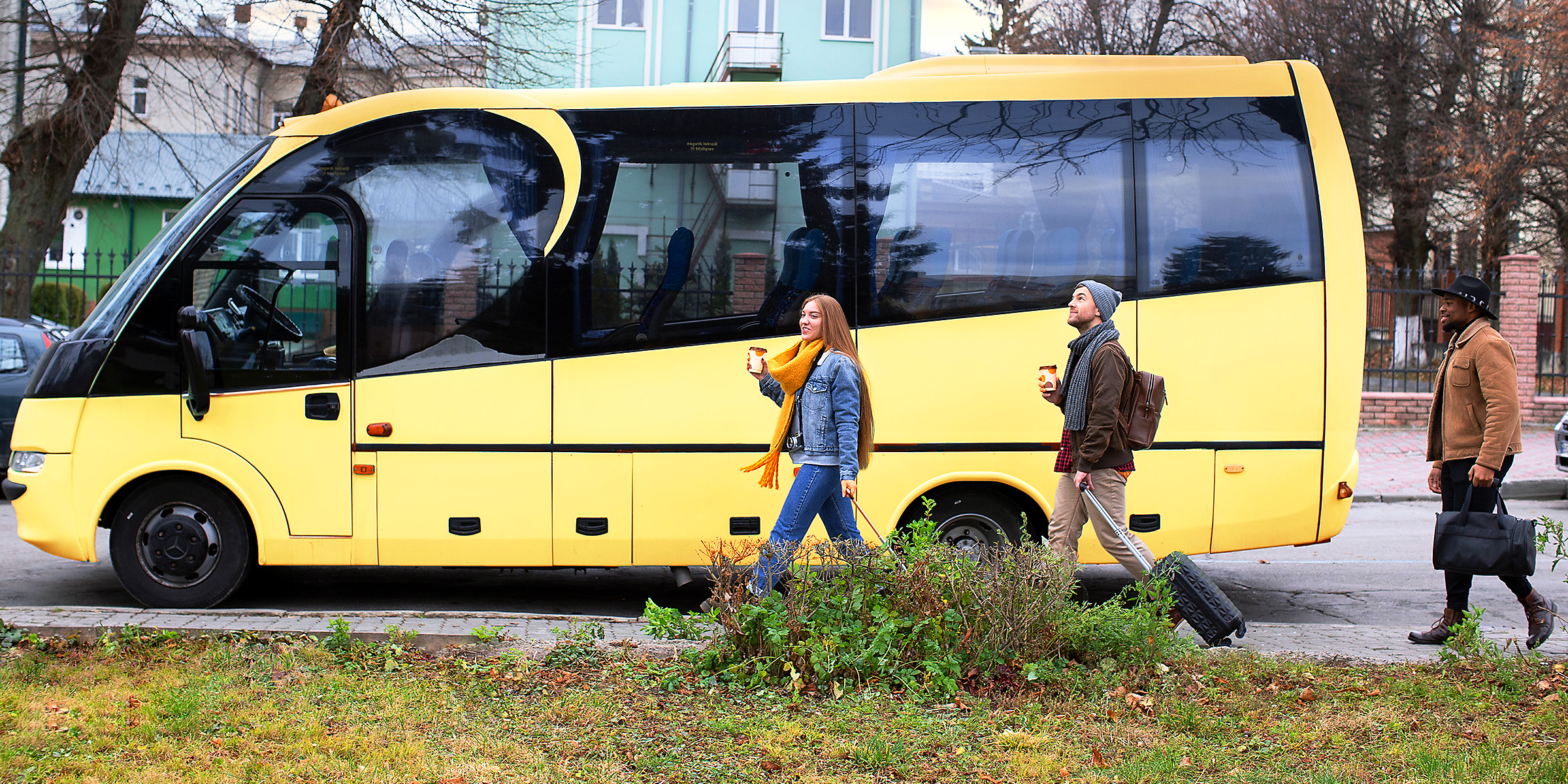 People walking near a bus | Source: Freepik