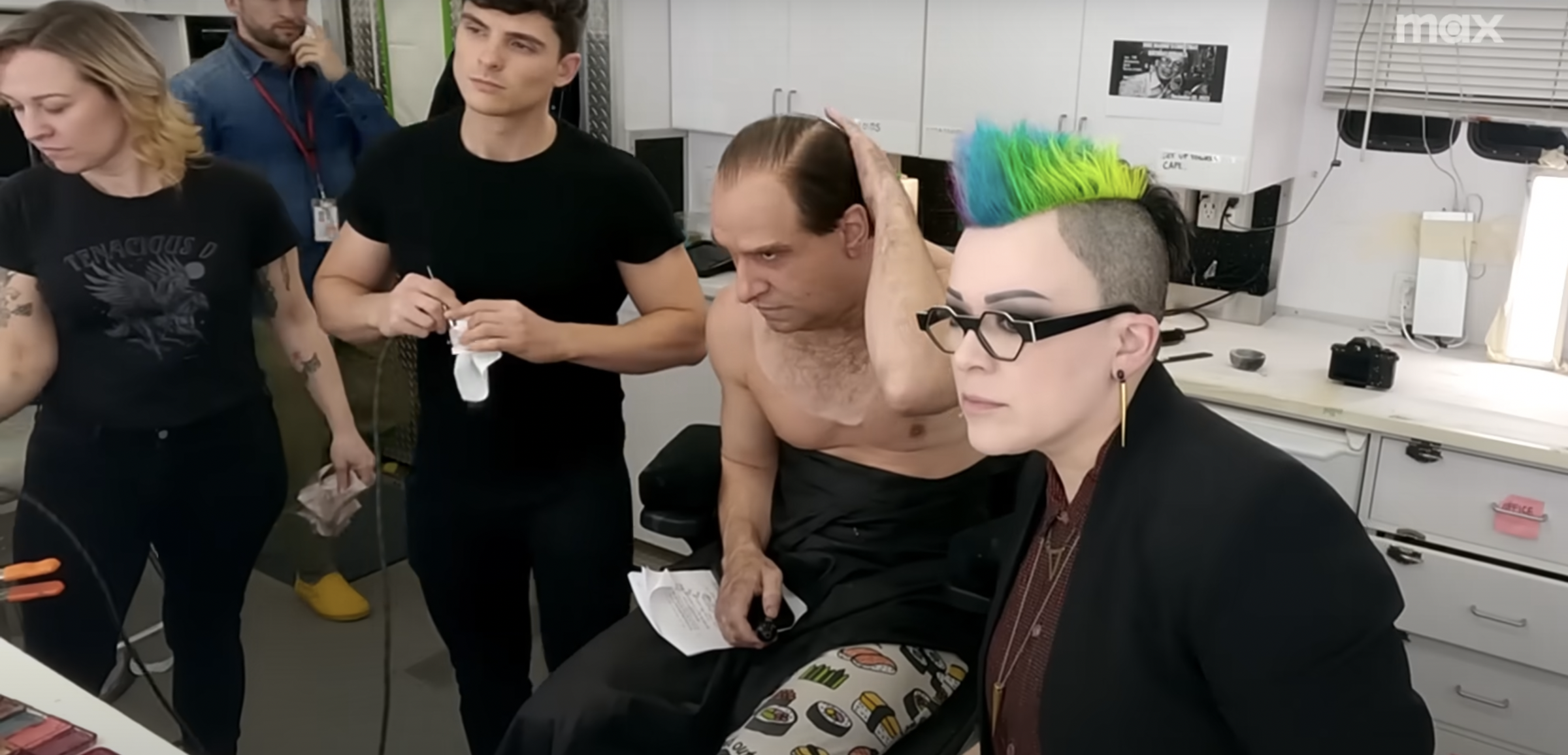 Colin Farrell and his team of makeup artists | Source: YouTube/Max