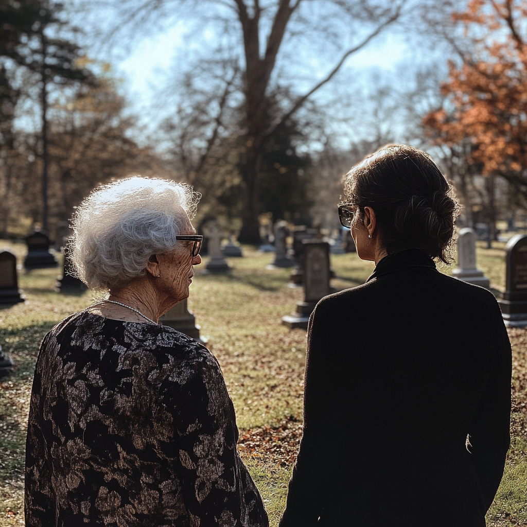 Senior woman and a young woman at a gravesite | Source: Midjourney