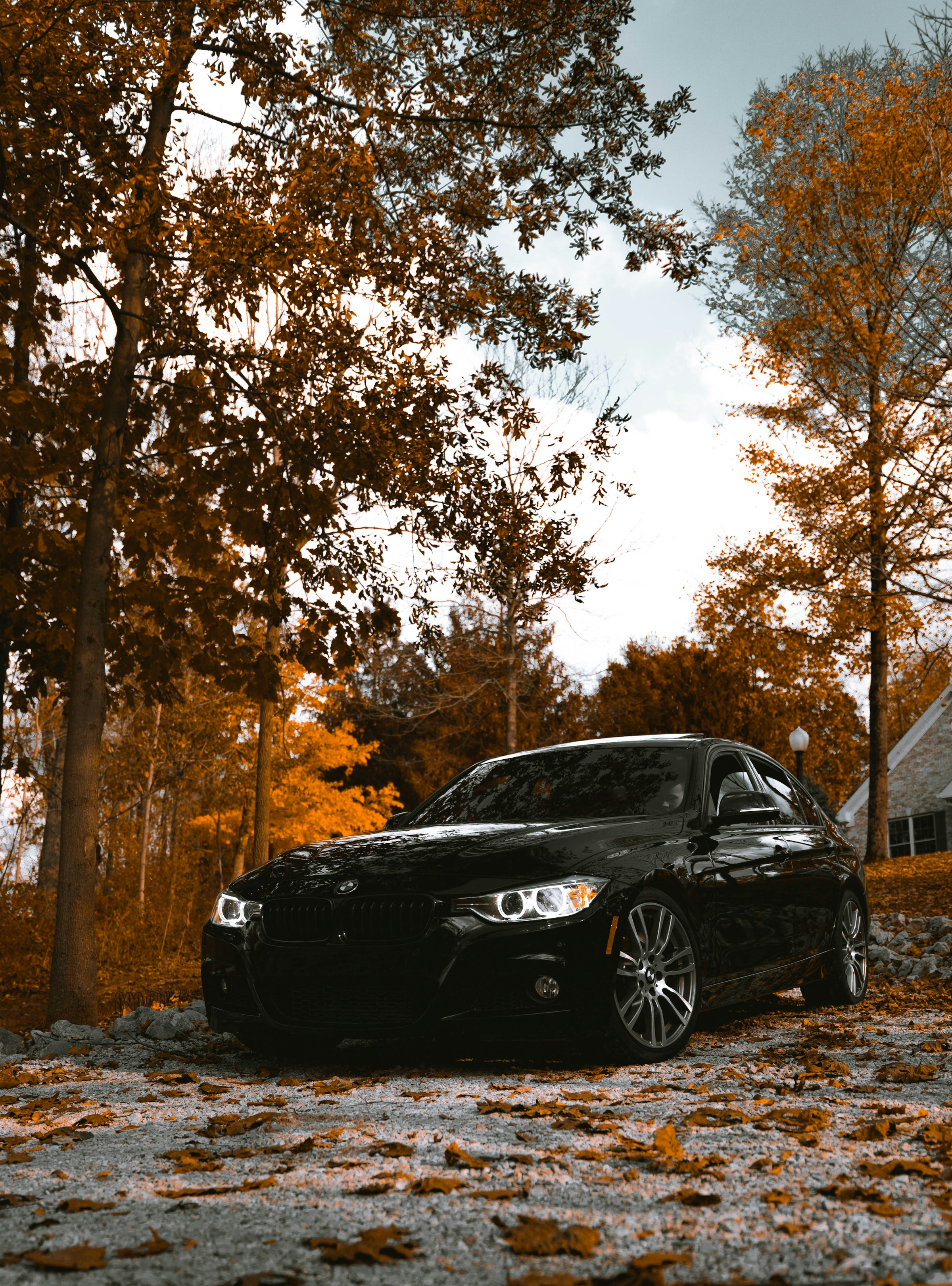 A black car on a driveway | Source: Unsplash