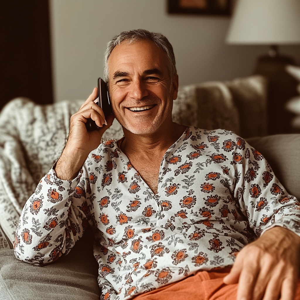 An older man talking on a phone | Source: Midjourney