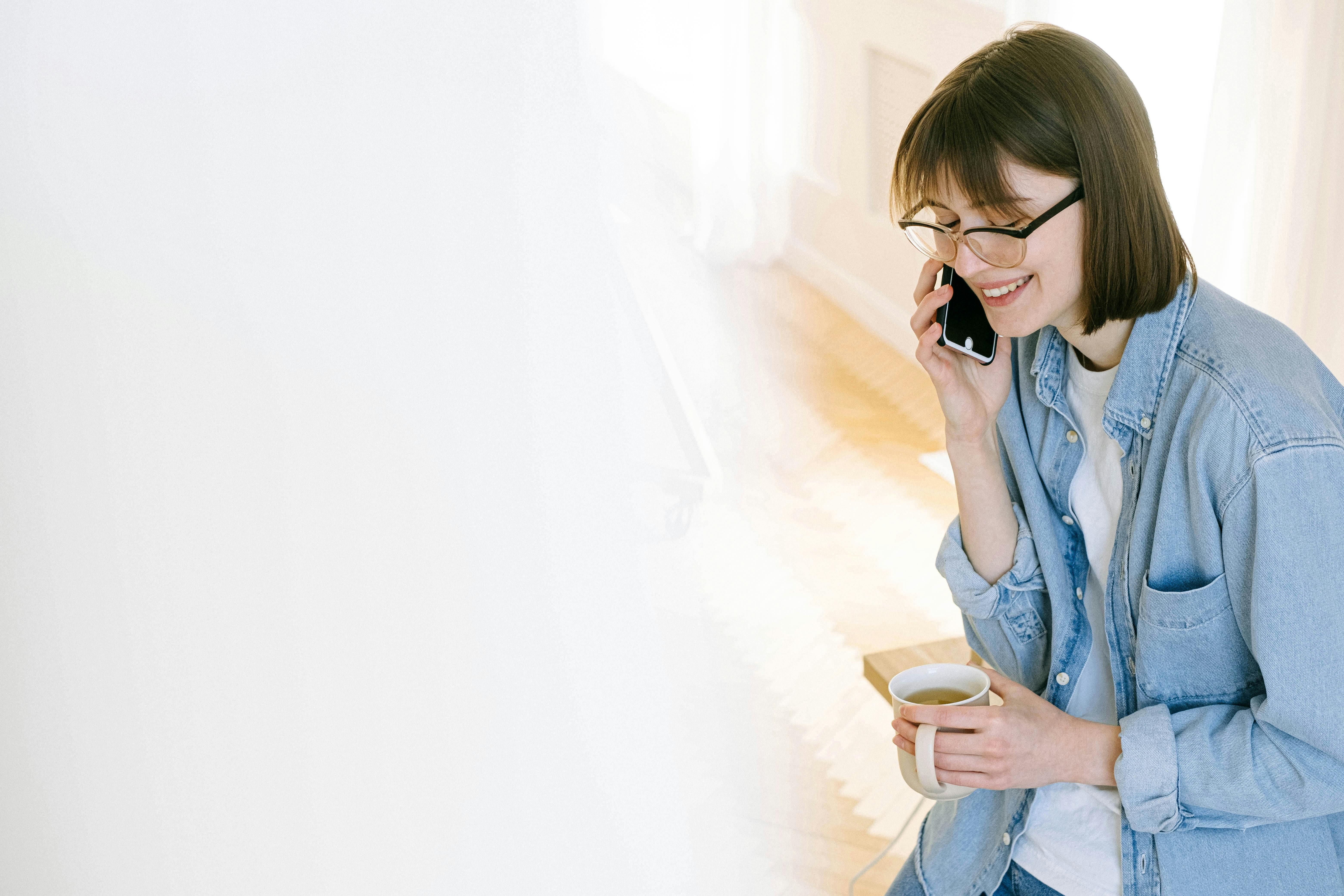 A happy woman on a call | Source: Pexels