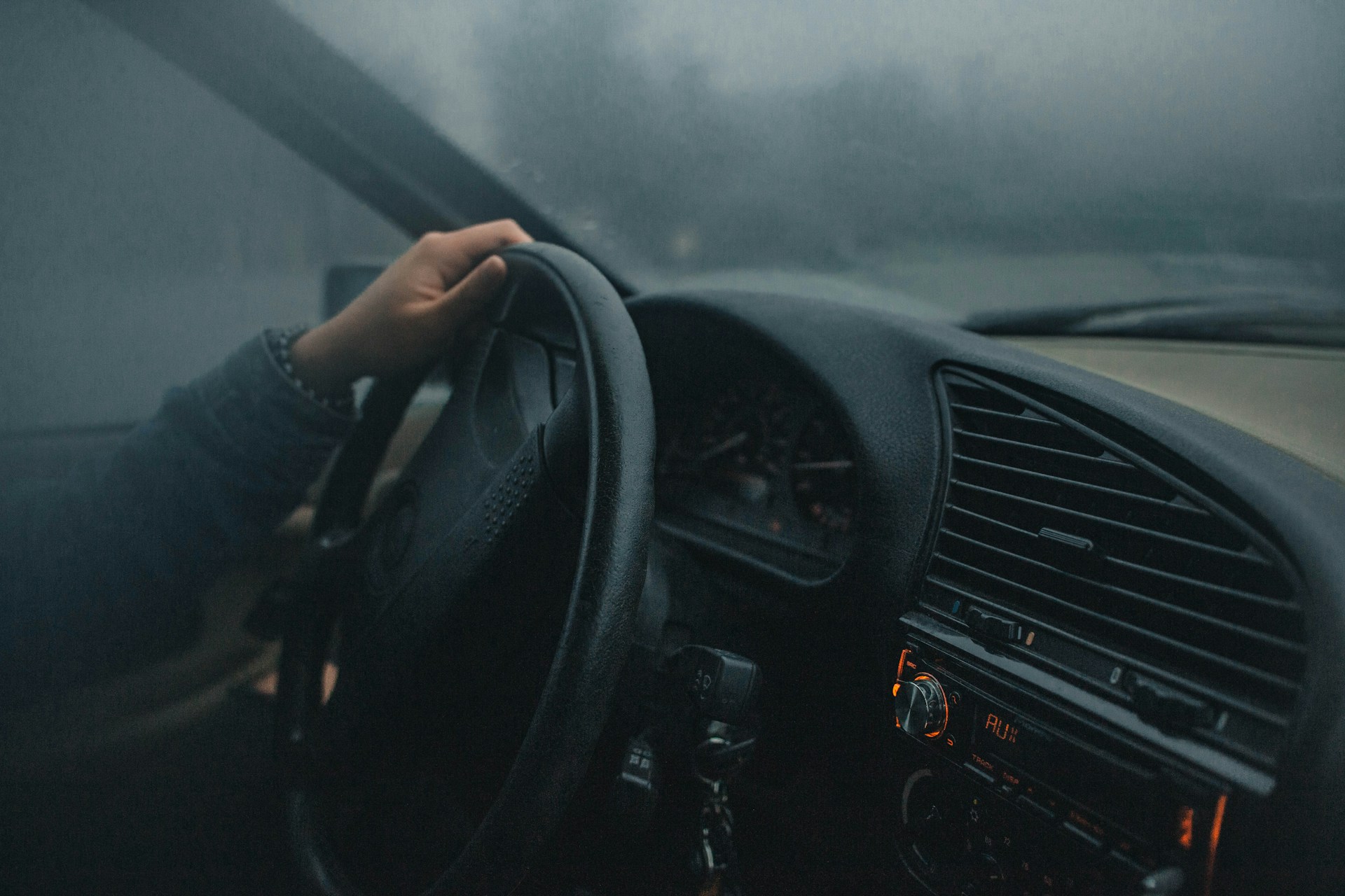A person sitting in a car | Source: Unsplash