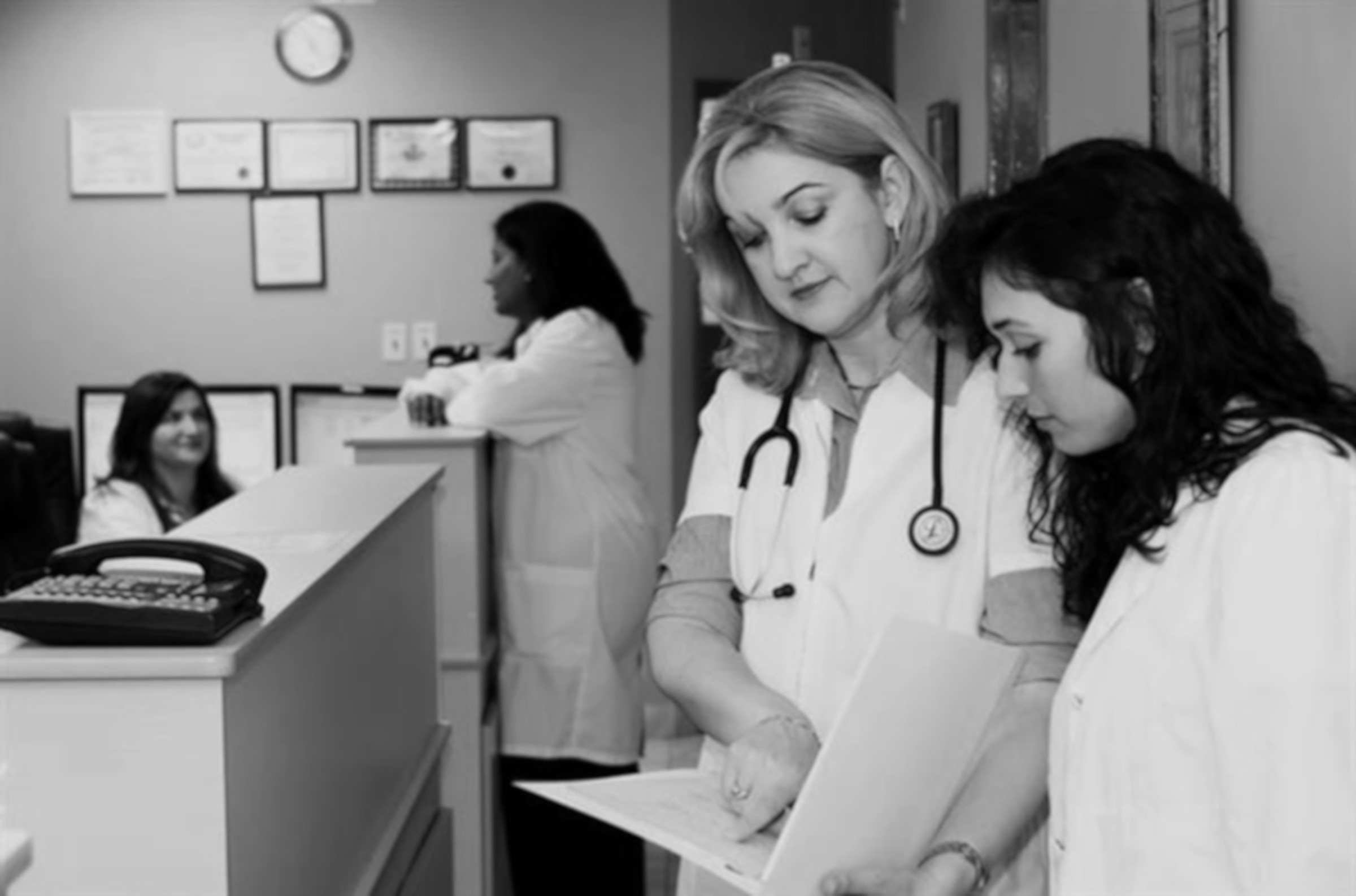 Doctors looking over tests in a hospital | Source: Unsplash