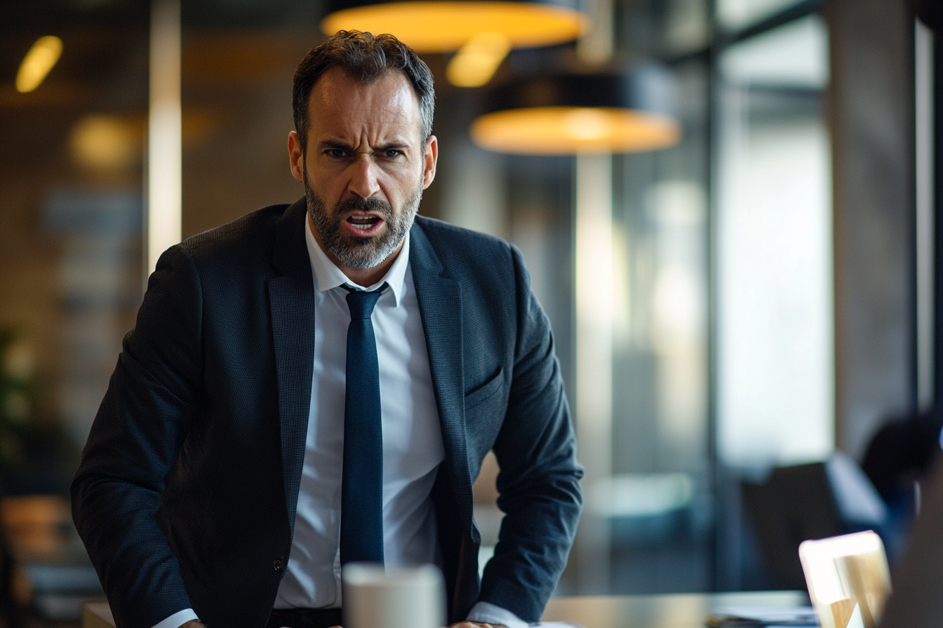 A man speaking angrily in a conference room | Source: Midjourney