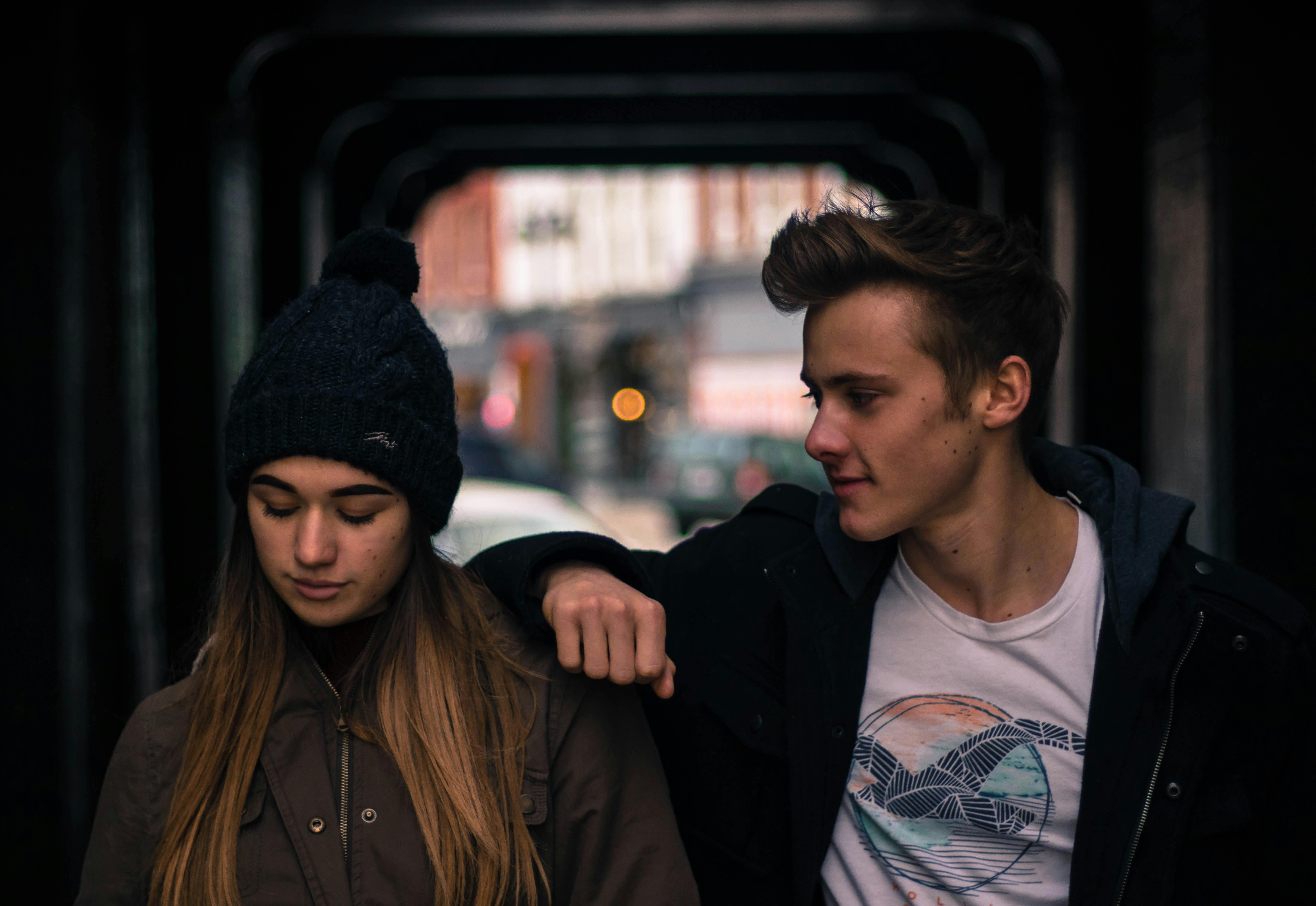 Young couple walking on the street | Source: Pexels
