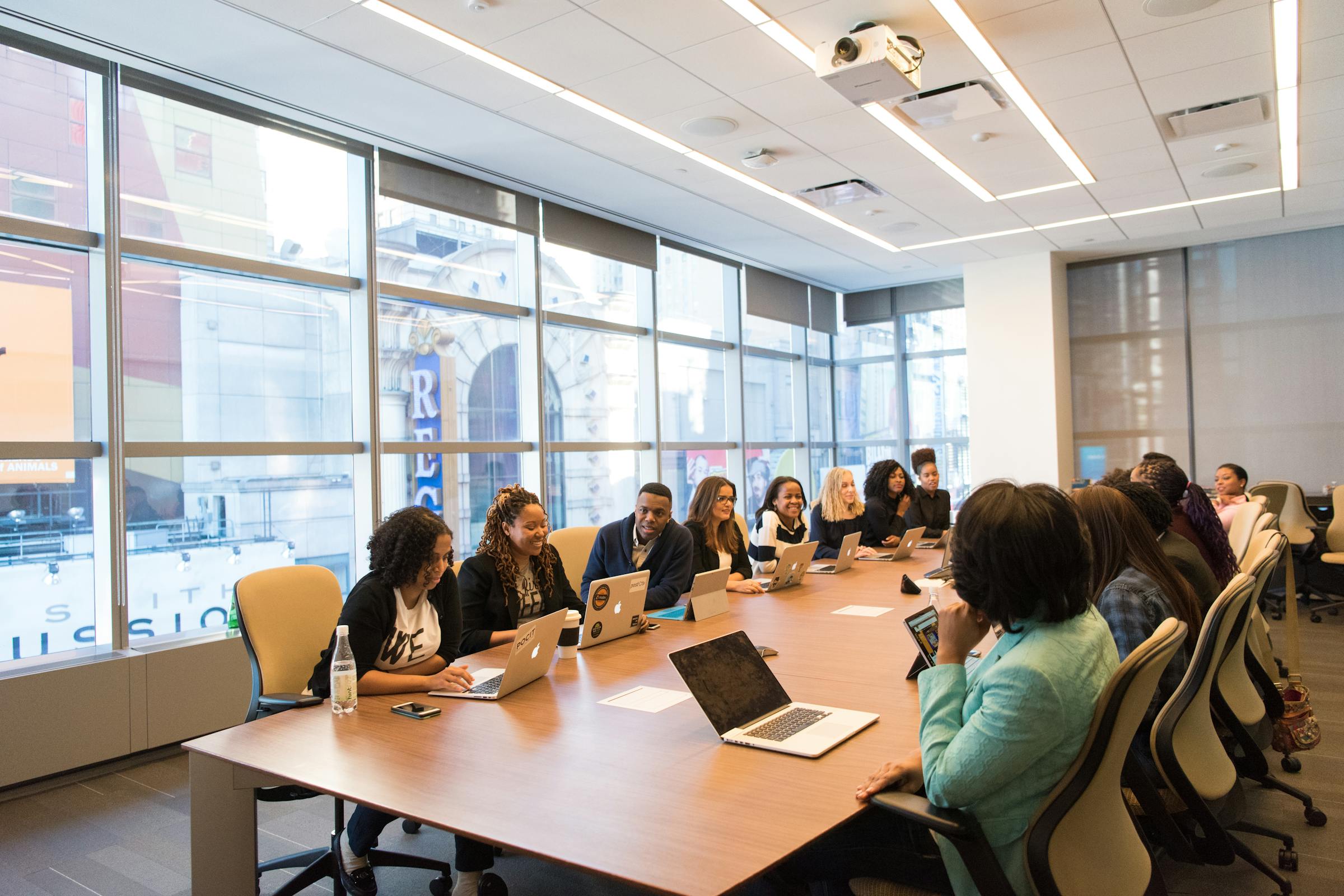 Executives gathered in a conference room | Source: Pexels