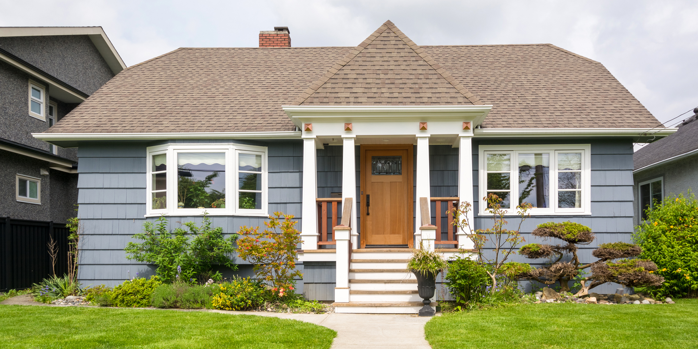 A blue sububrab house | Source: Shutterstock