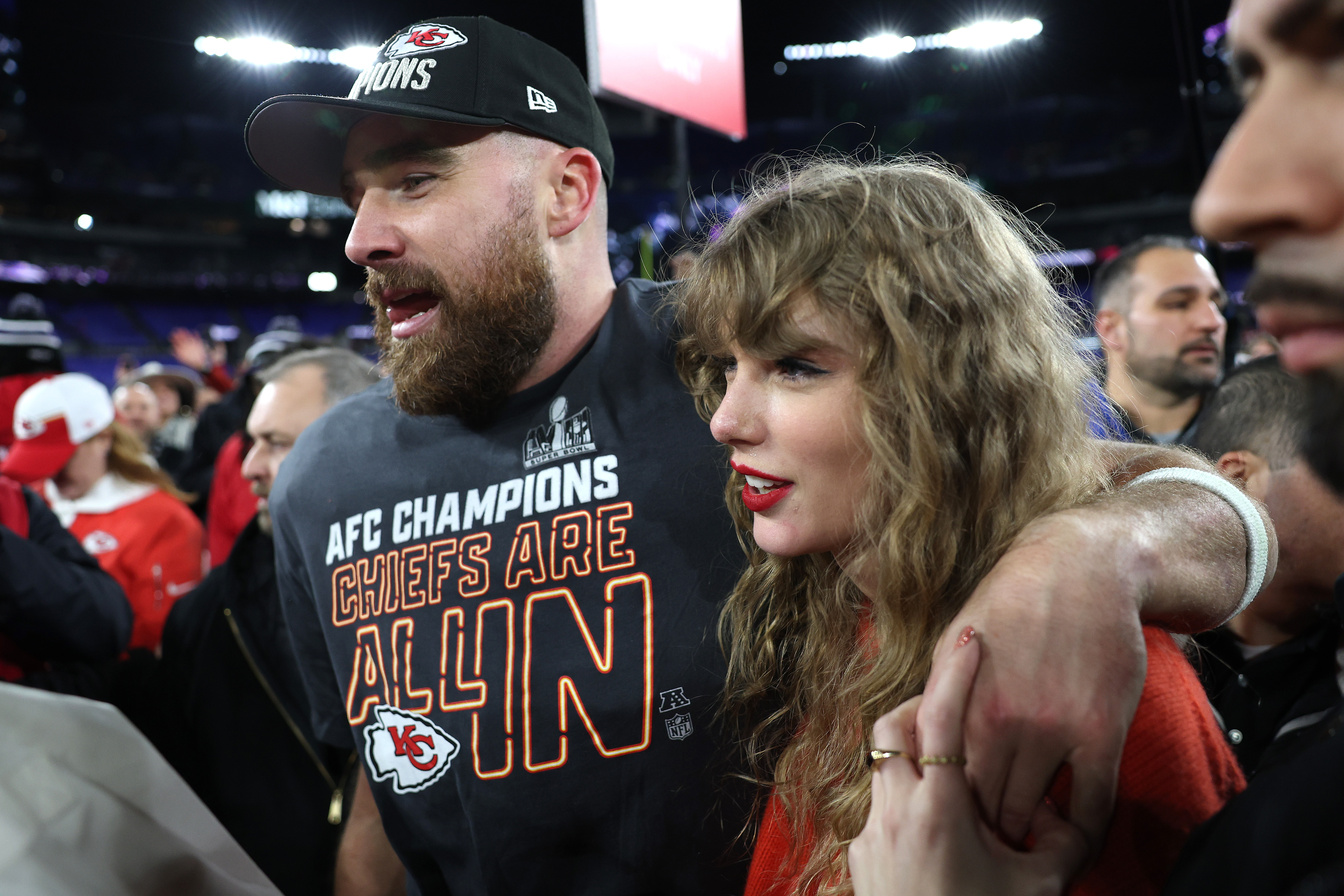 Travis Kelce celebrates with Taylor Swift after a victory against the Baltimore Ravens in the AFC Championship Game at M&T Bank Stadium on January 28, 2024, in Baltimore, Maryland. | Source: Getty Images