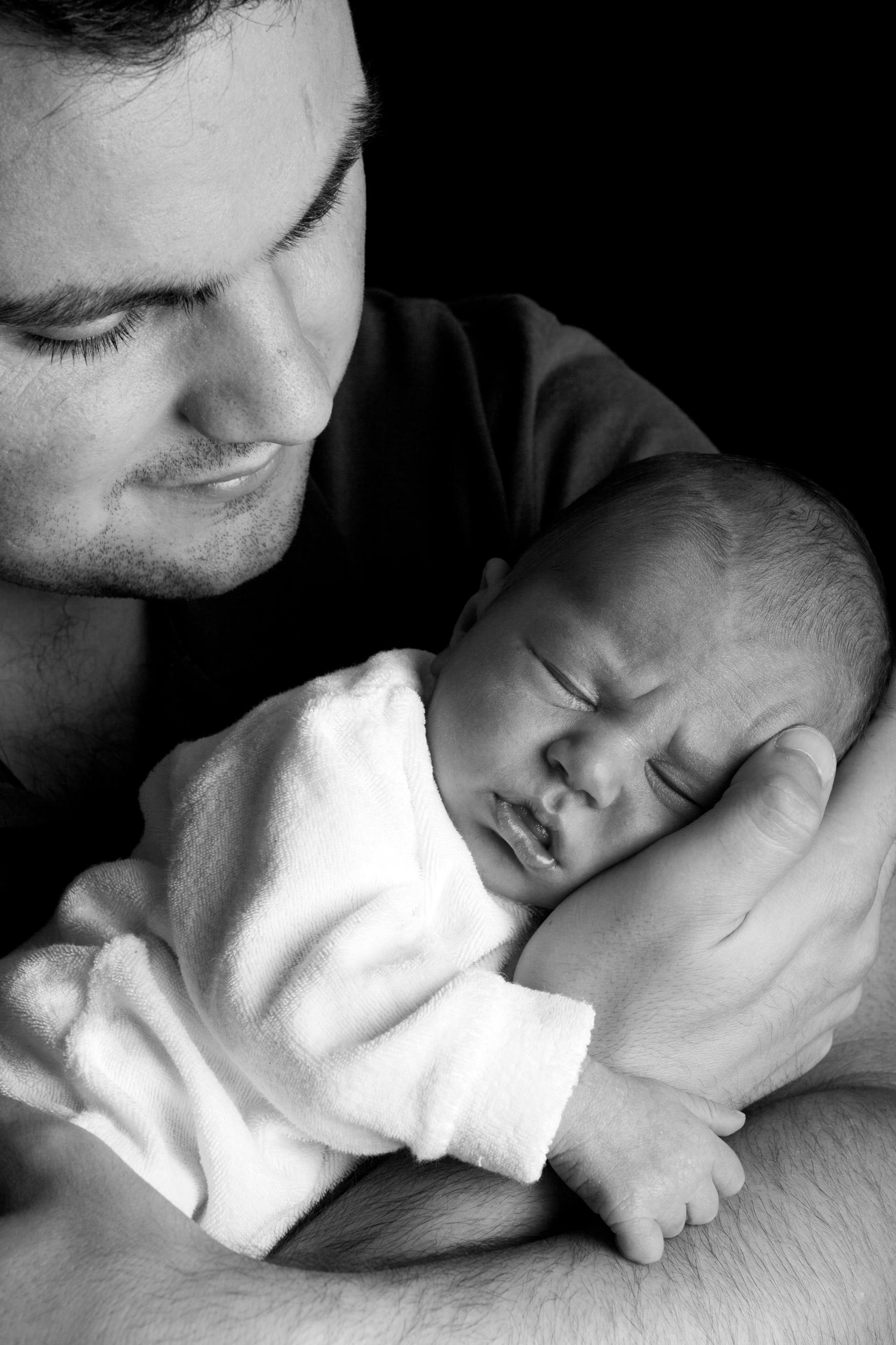 A man with a baby | Source: Pexels