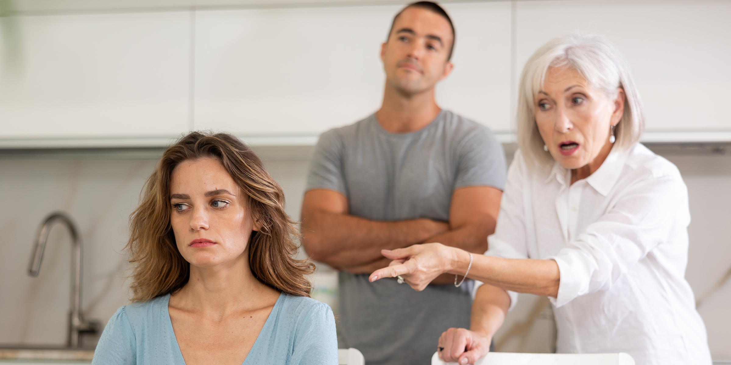 A woman being berated by her mother-in-law | Source: Shutterstock