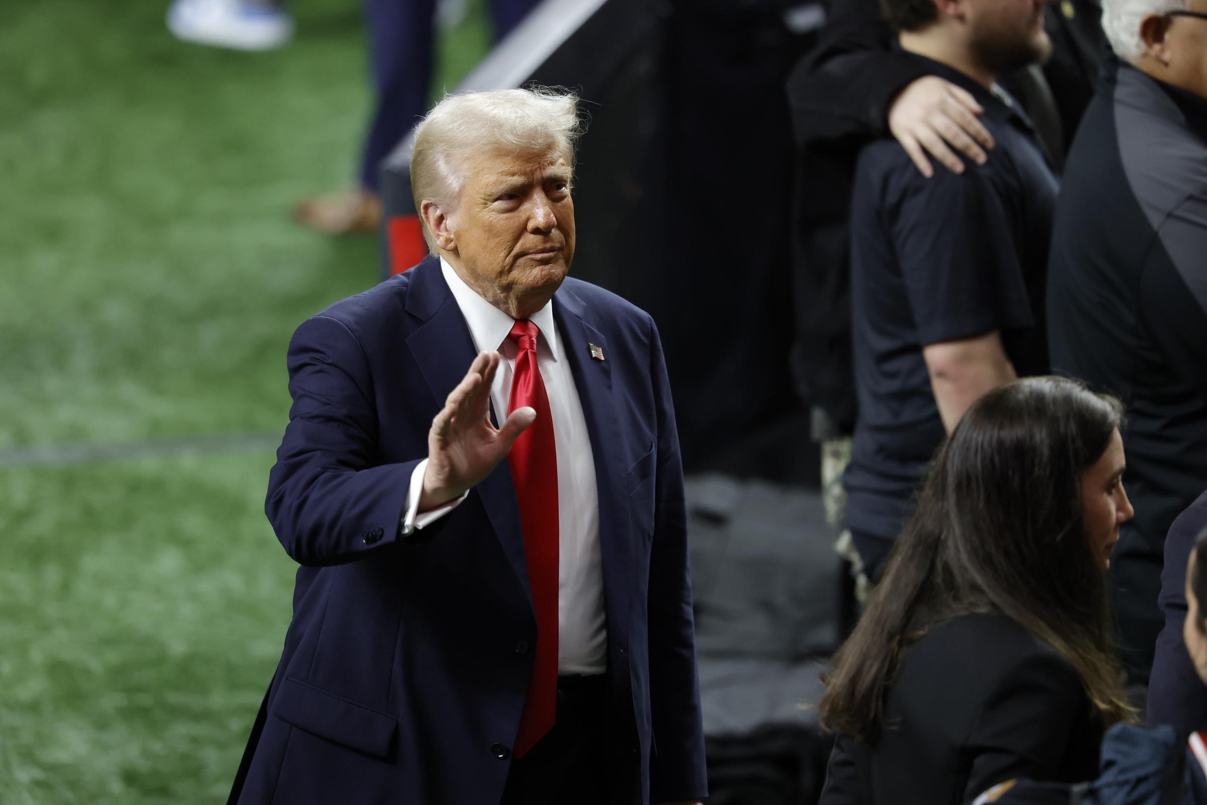 Donald Trump waves to spectators at the Super Bowl LIX on February 9, 2025, in New Orleans, Louisiana. | Source: Getty Images