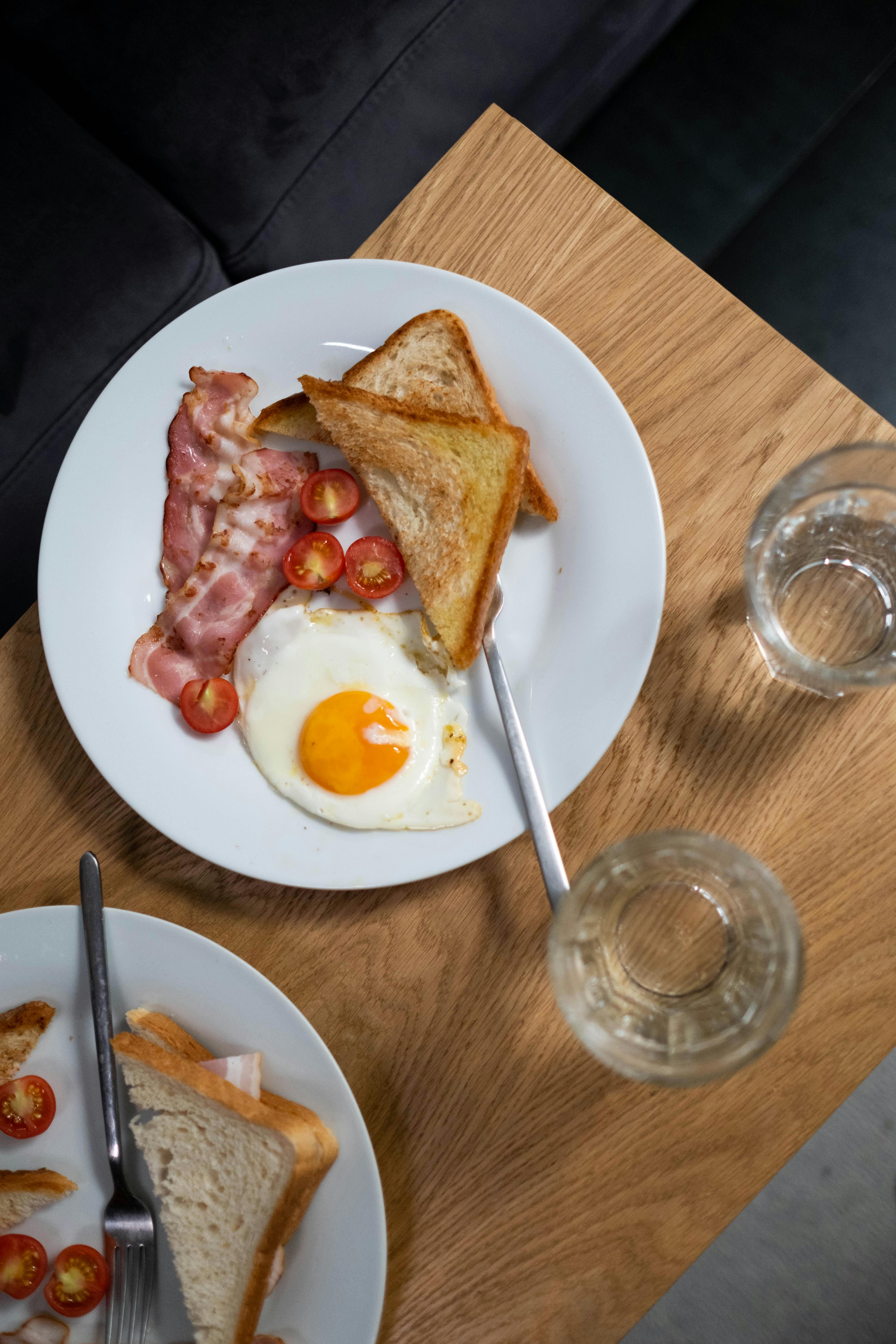 Breakfast plates on a table | Source: Pexels
