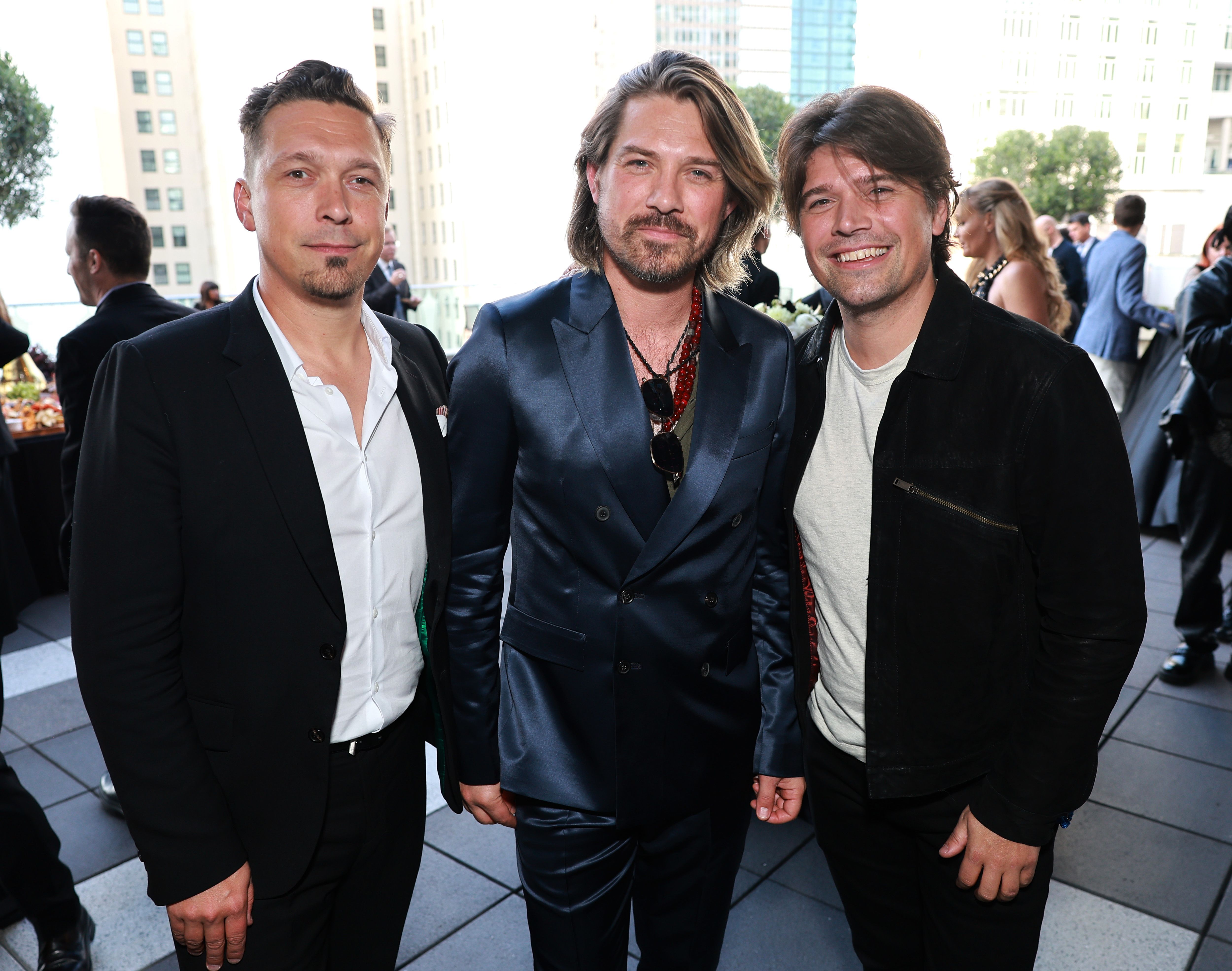 Isaac, Taylor, and Zac Hanson at the Grammy Museum's Inaugural Grammy Hall of Fame Gala and Concert on May 21, 2024, in Los Angeles, California. | Source: Getty Images