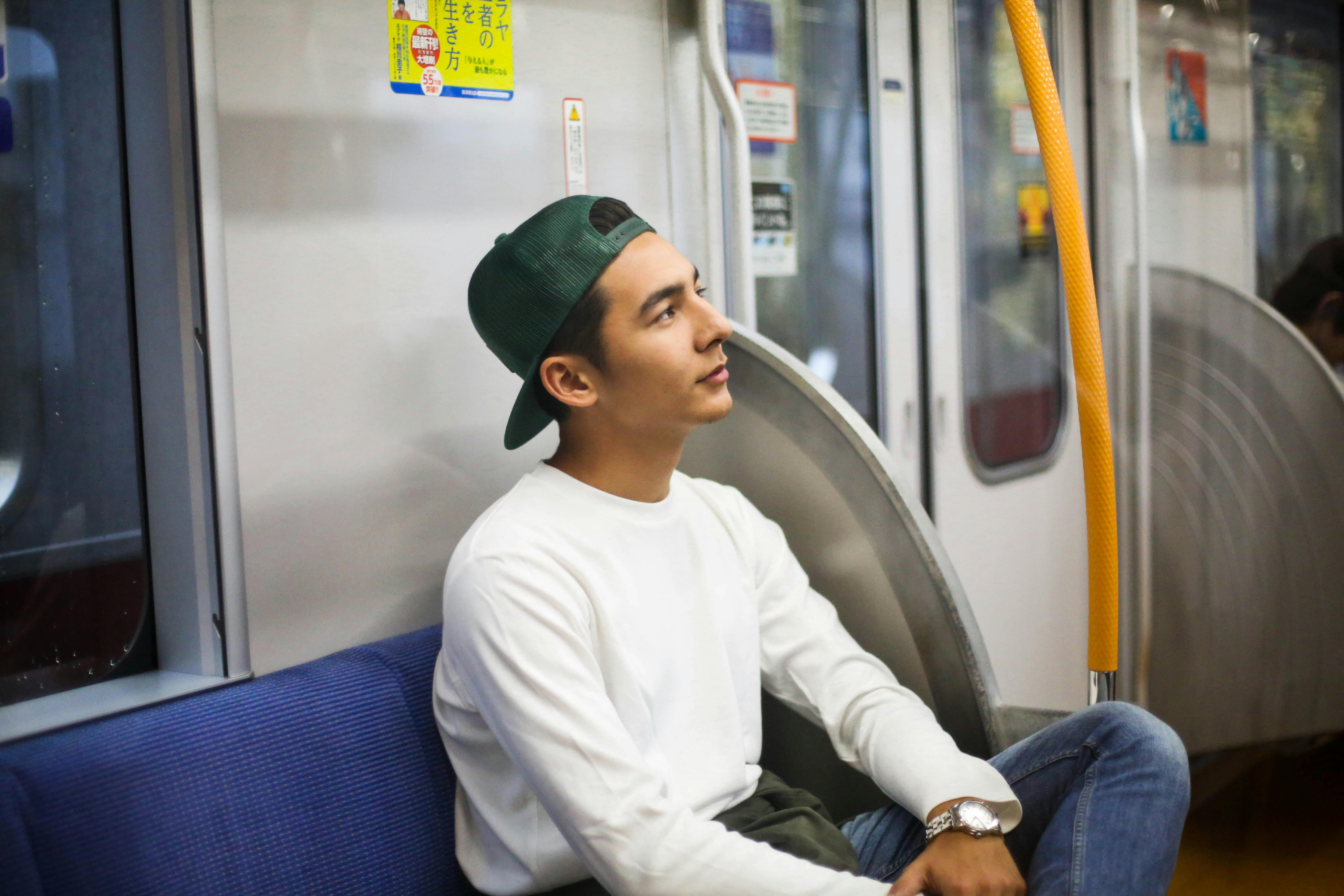 Young man inside a train | Source: Pexels