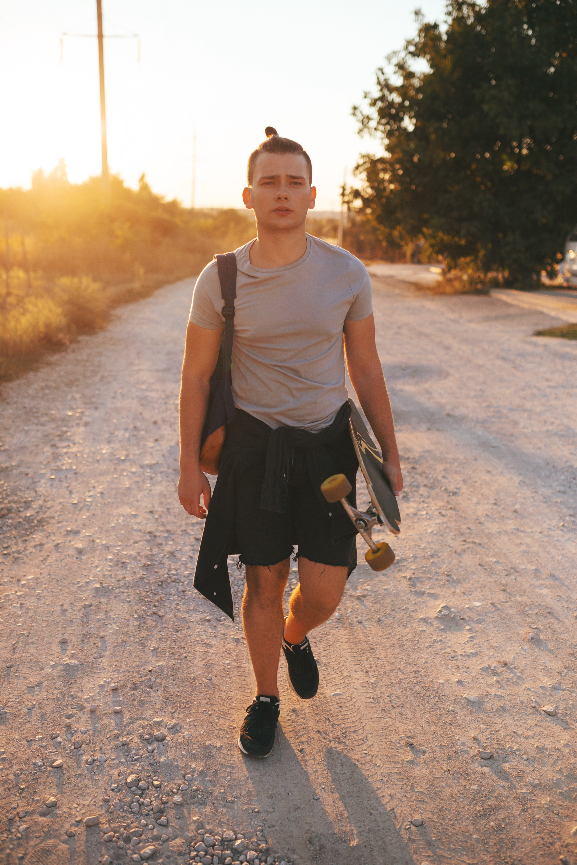 A teenage boy walking away | Source: Freepik