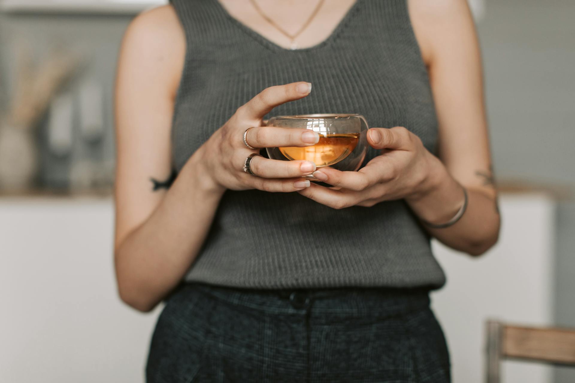 A close-up of a woman holding a cup of tea | Source: Pexels