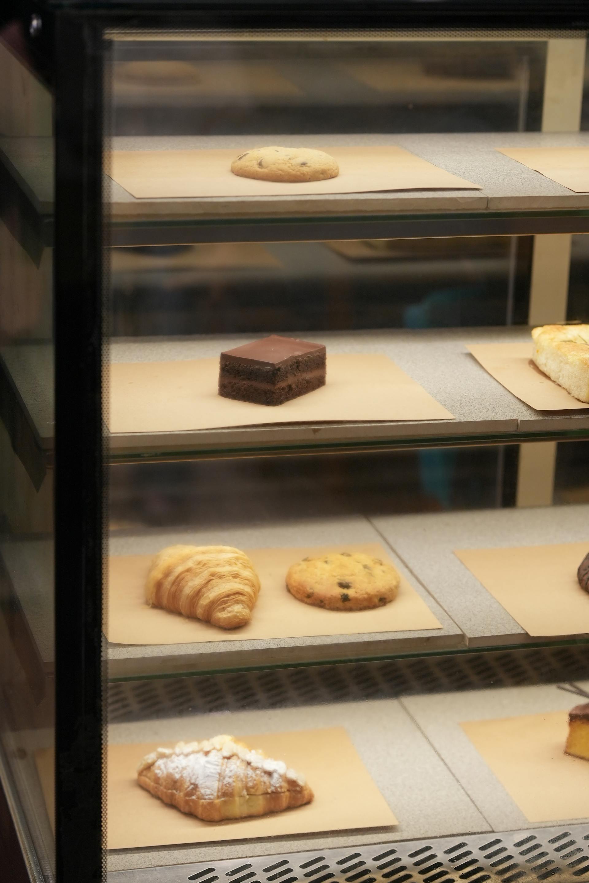 A near-empty bakery display case | Source: Pexels