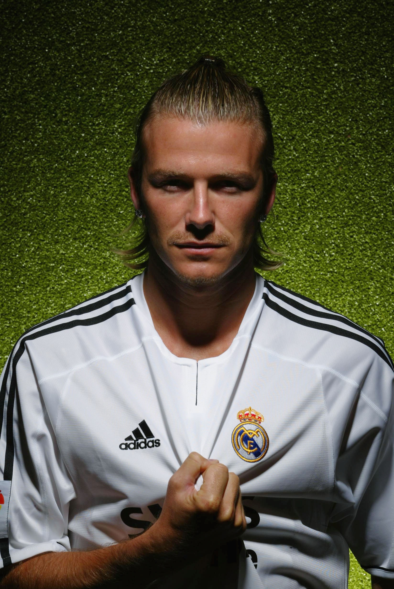 David Beckham wears his Real Madrid, #23 shirt on July 2, 2003, in Madrid, Spain. | Source: Getty Images