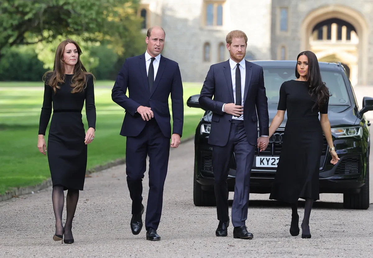 Catherine, Princess of Wales, Prince William, Prince of Wales, Prince Harry, Duke of Sussex, and Meghan, Duchess of Sussex on the long Walk at Windsor Castle arrive to view flowers and tributes to HM Queen Elizabeth on September 10, 2022 in Windsor, England. | Source: Getty Images