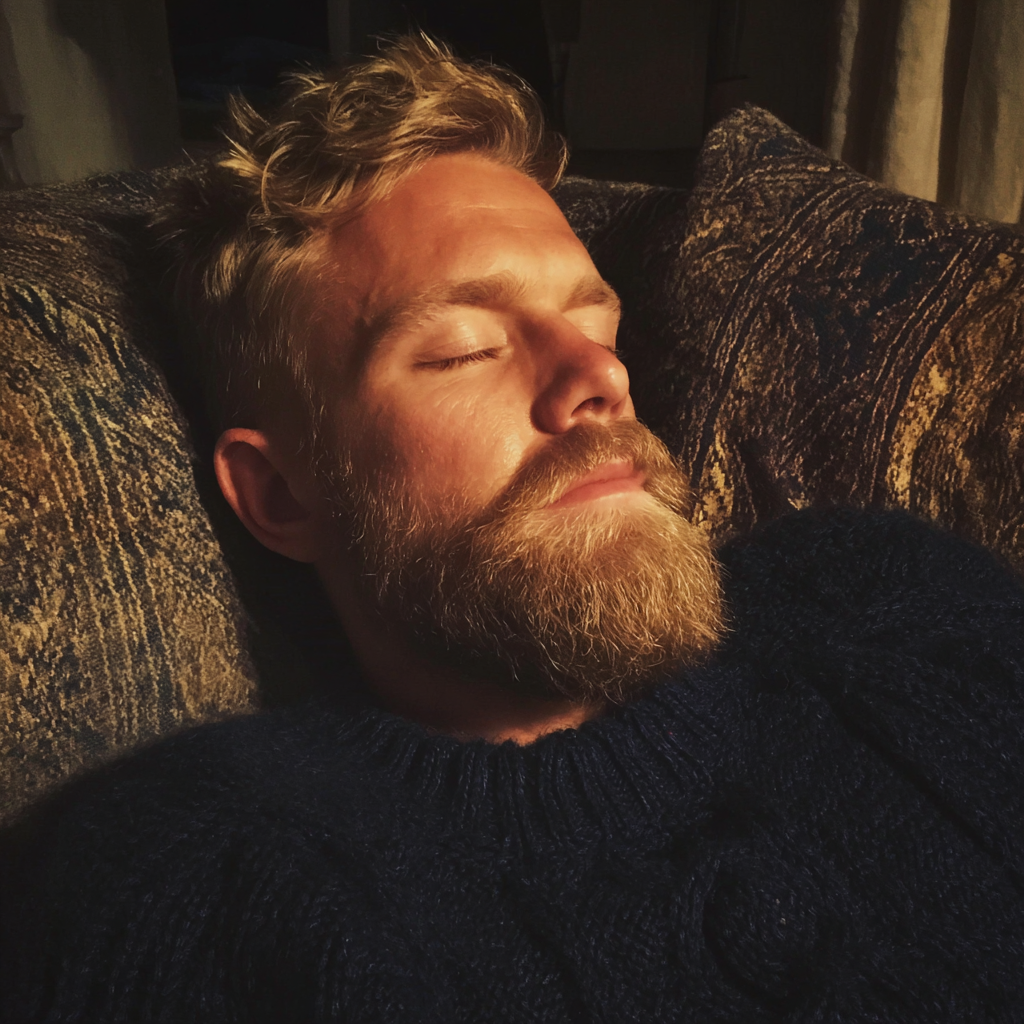 Mężczyzna śpiący na kanapie | Źródło: Midjourney