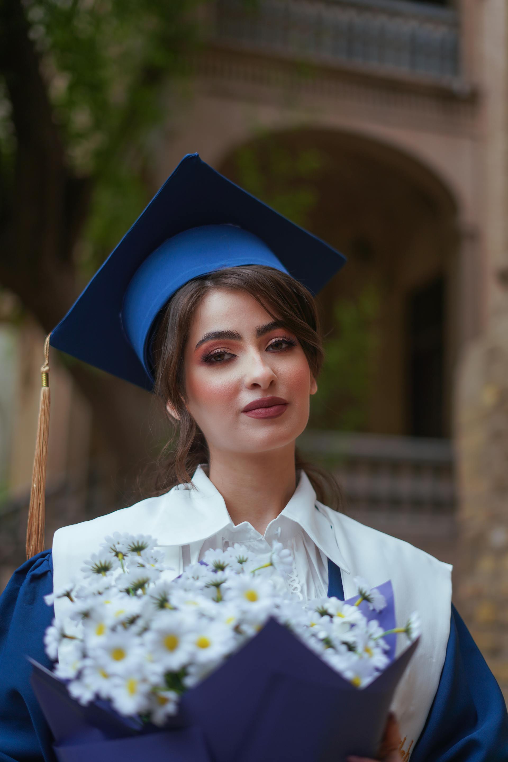 An unhappy teenage girl at her graduation | Source: Pexels