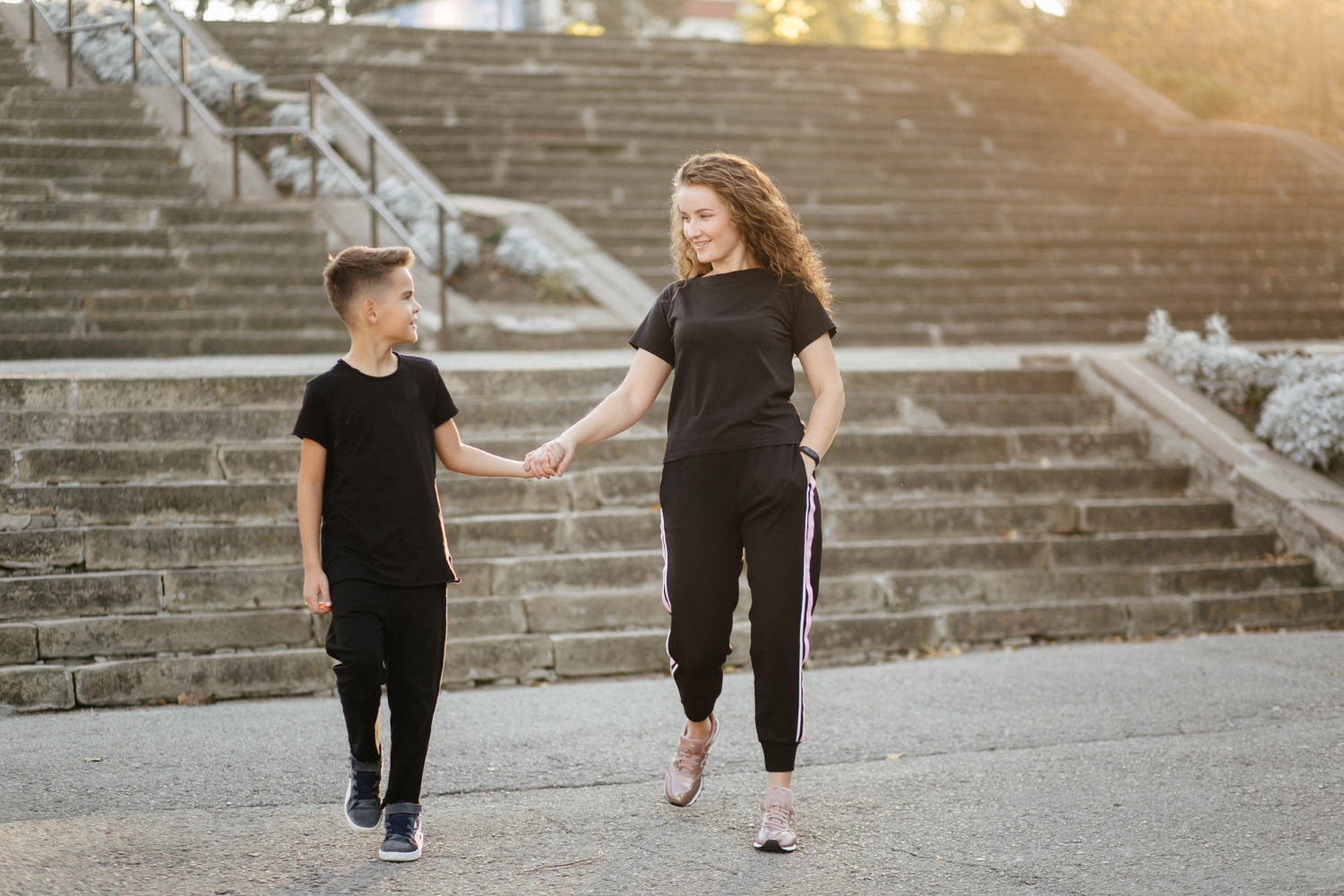 A mother and son walking together | Source: Freepik