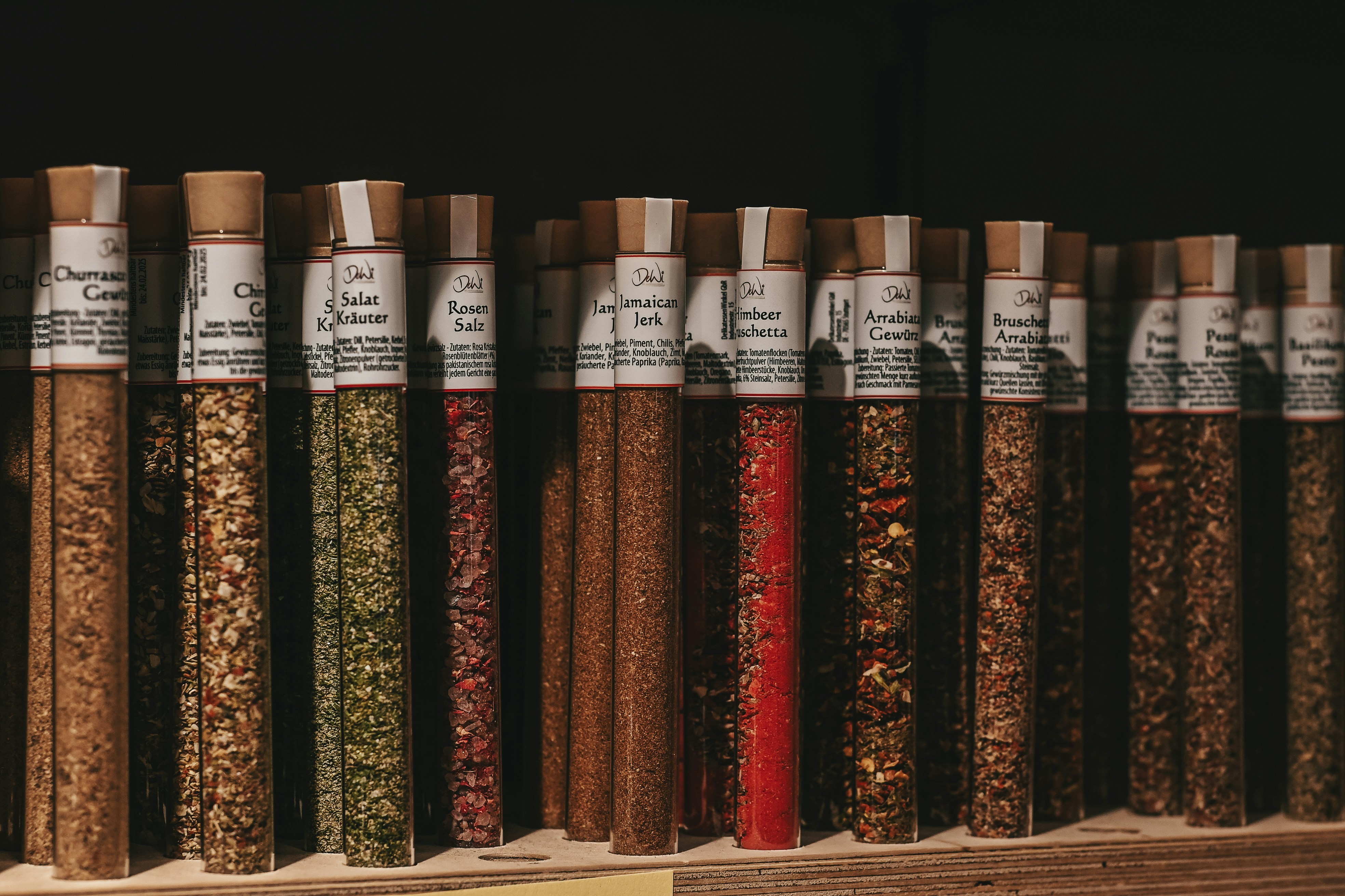 Neat spices on a rack | Source: Unsplash