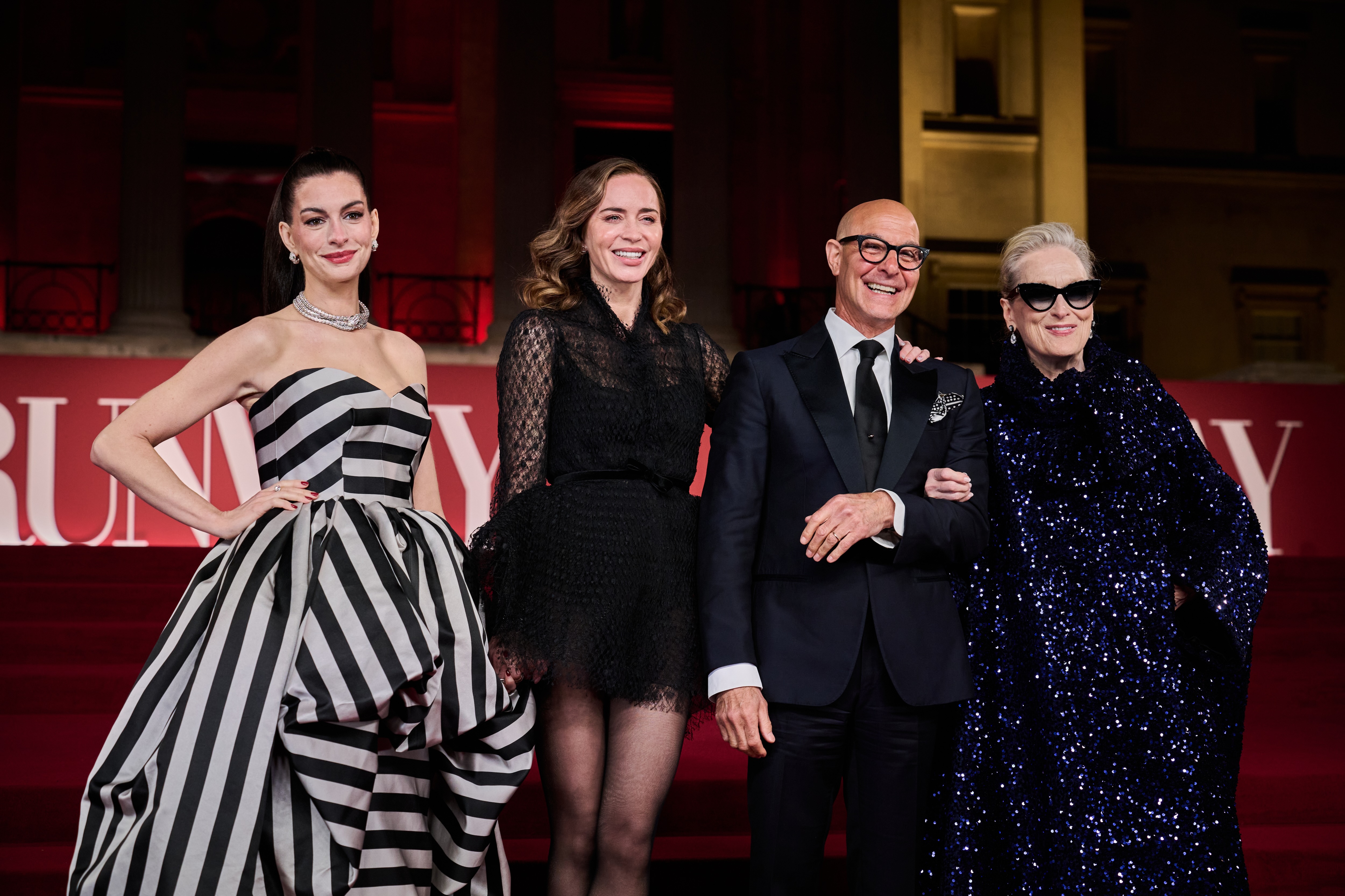 Anne Hathaway, Emily Blunt, Stanley Tucci and Meryl Streep attend "A Night With Runway" Photocall for "The Devil Wears Prada 2" at The National Gallery on April 22, 2026 in London, England. | Source: Getty Images
