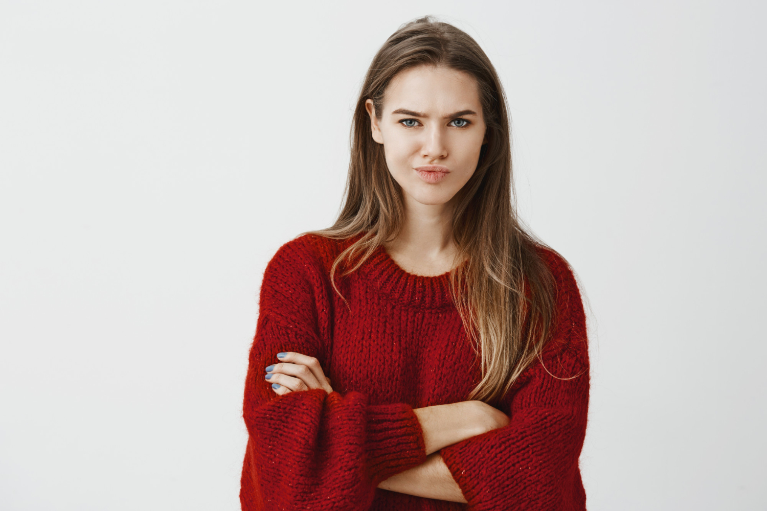 A woman with her arms crossed | Source: Freepik