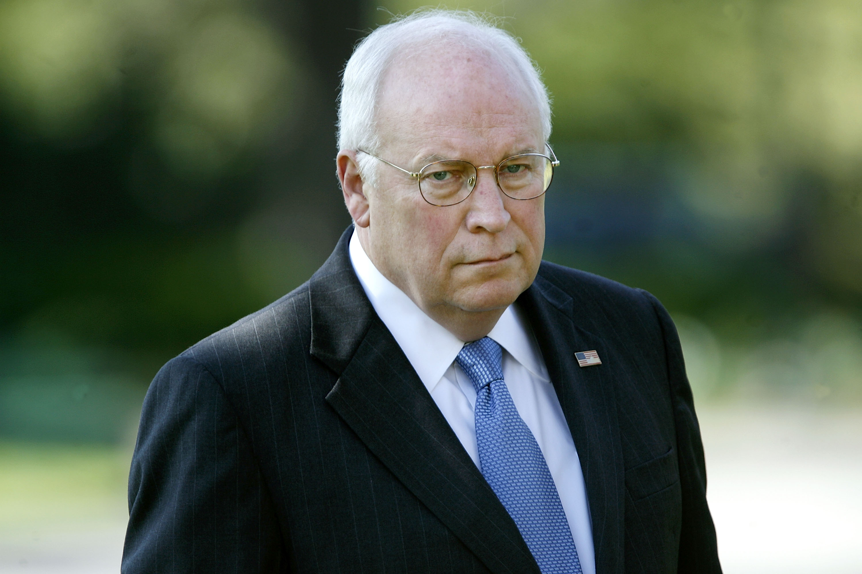 Dick Cheney watches as President George W. Bush holds a news conference about the war appropriations bill in the Rose Garden of the White House March 3, 2007, in Washington, DC. | Source: Getty Images
