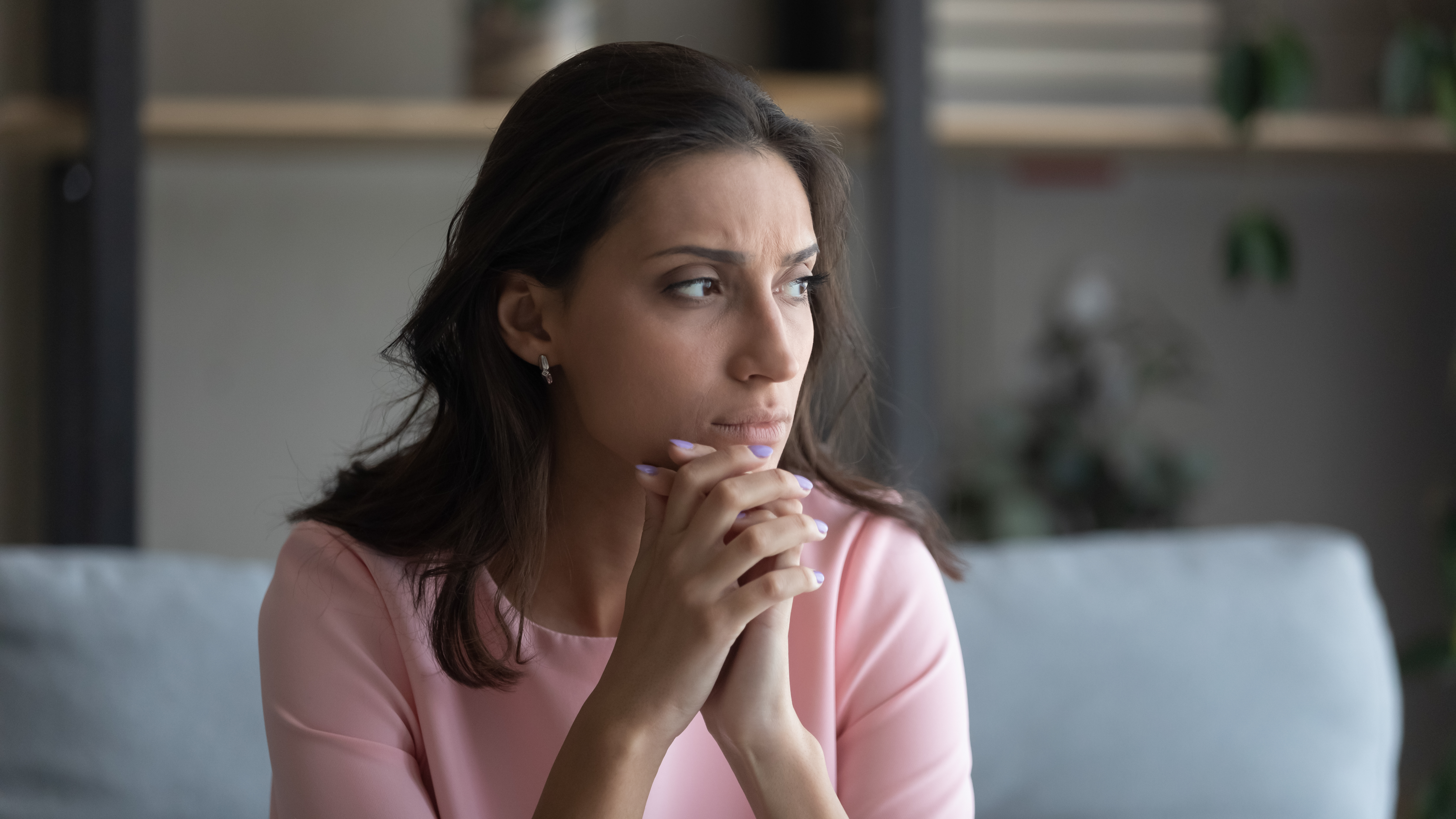 A concerned woman | Source: Shutterstock