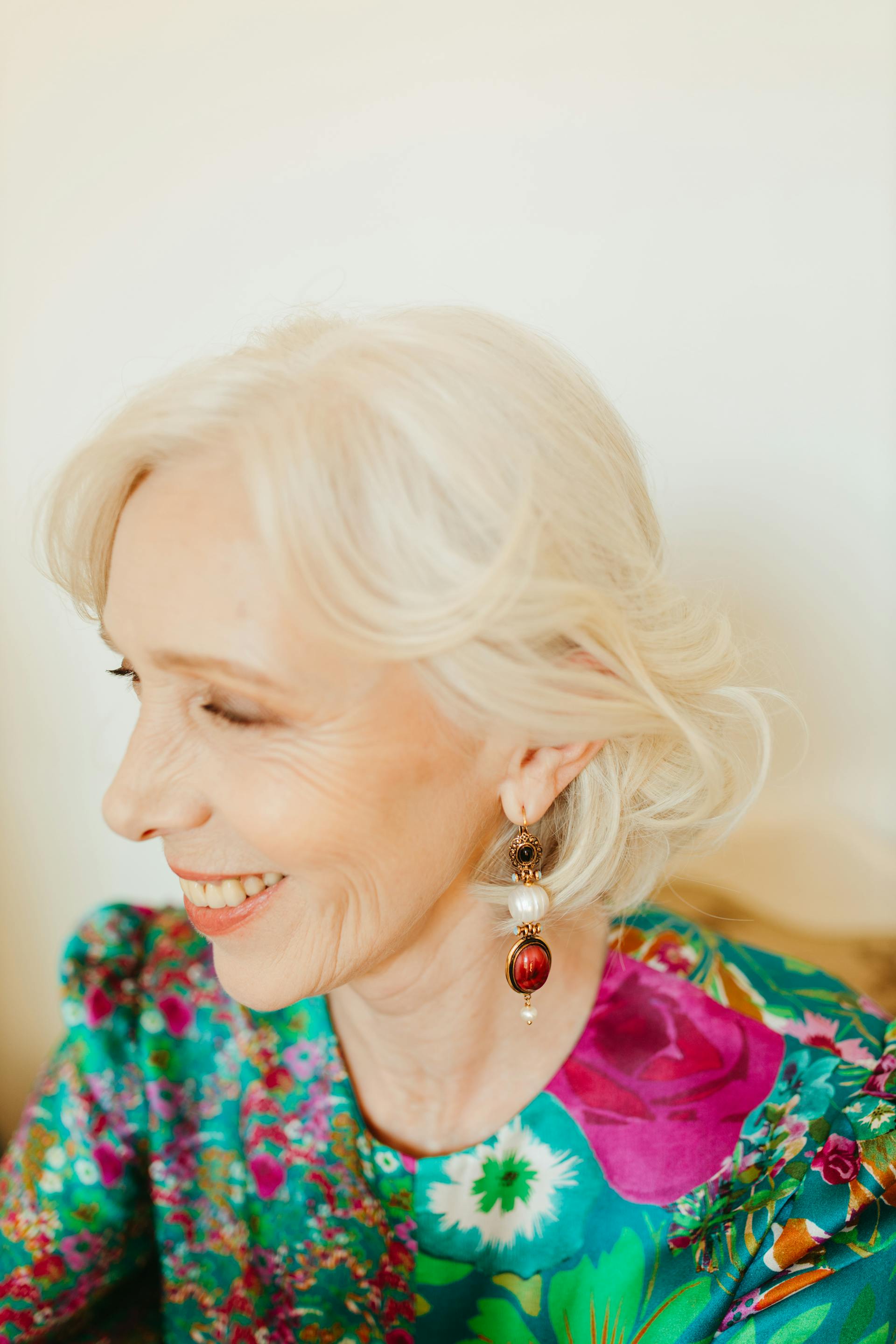 A close-up shot of a senior woman smiling | Source: Pexels