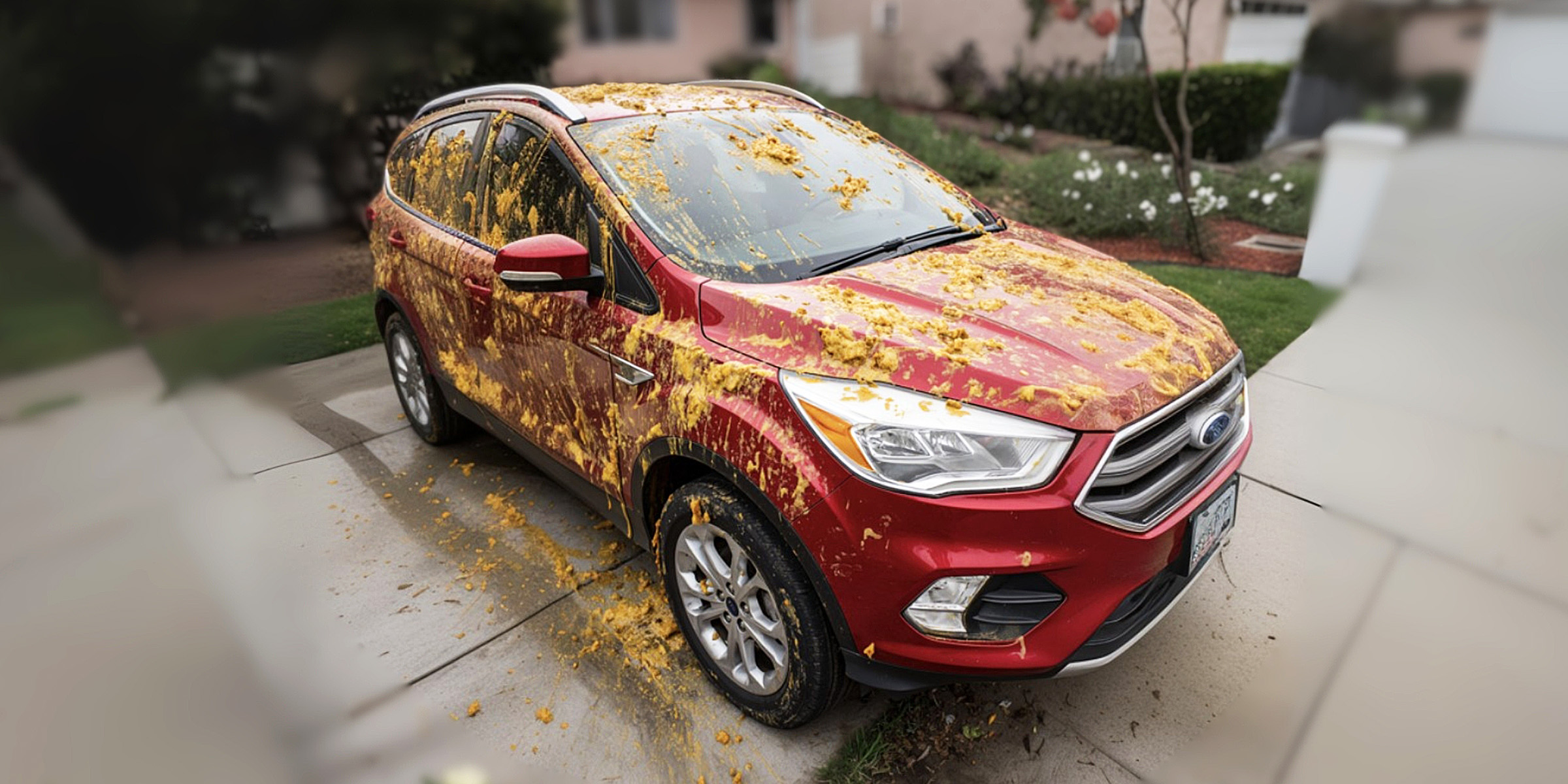 A dirty red car | Source: The Celebritist