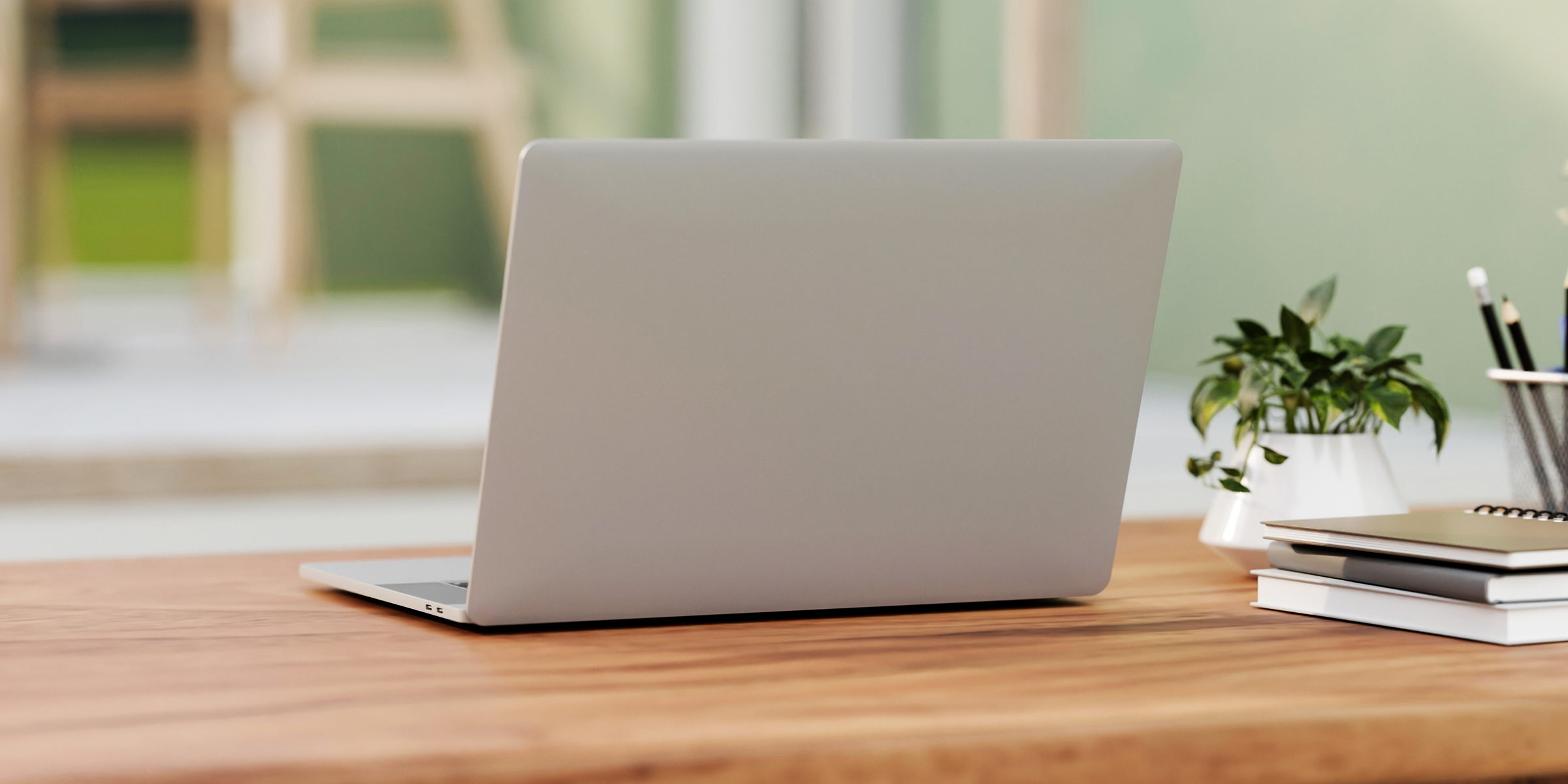 A laptop on a table | Source: Shutterstock