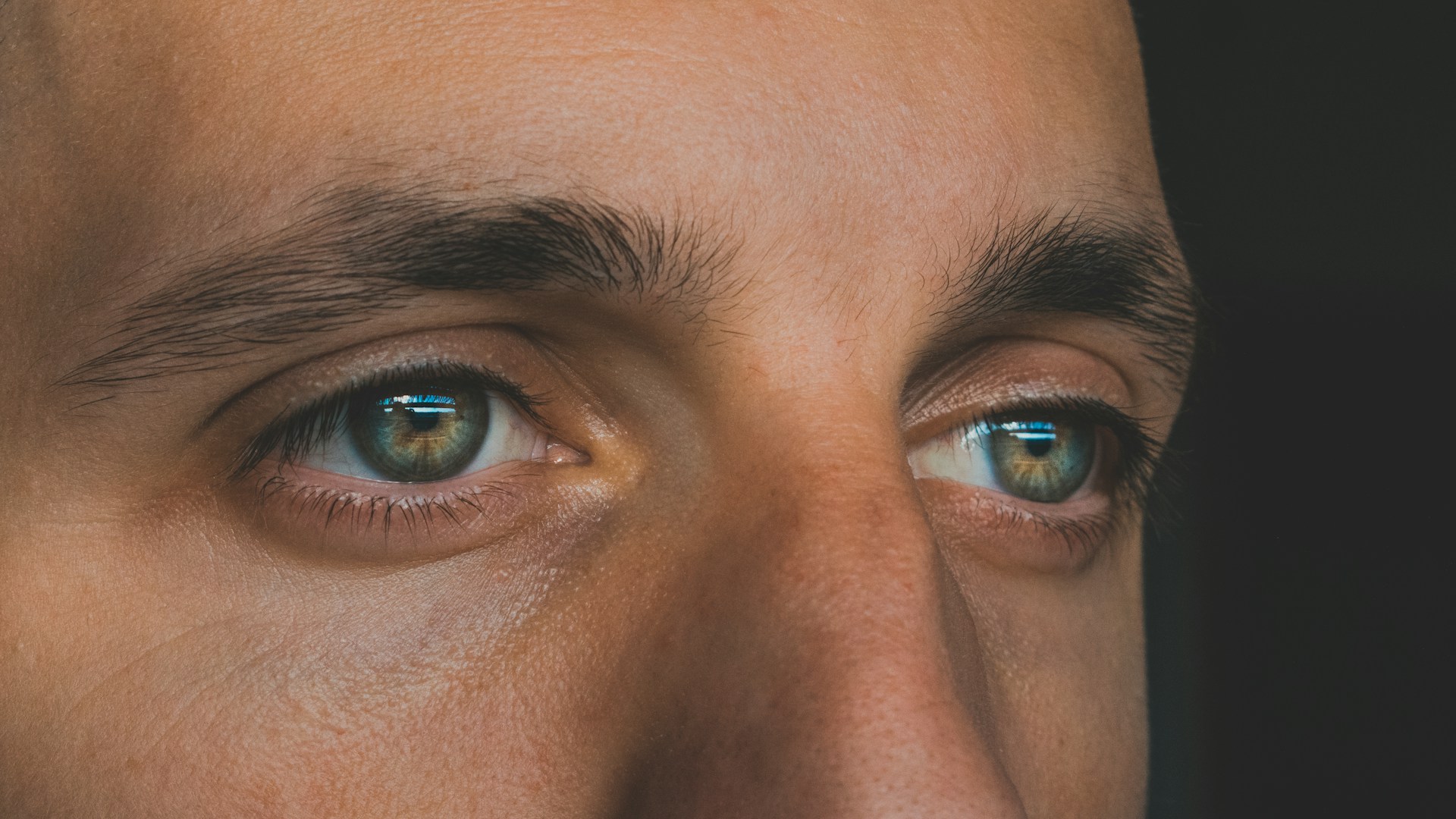 A close-up shot of a man's eyes | Source: Unsplash