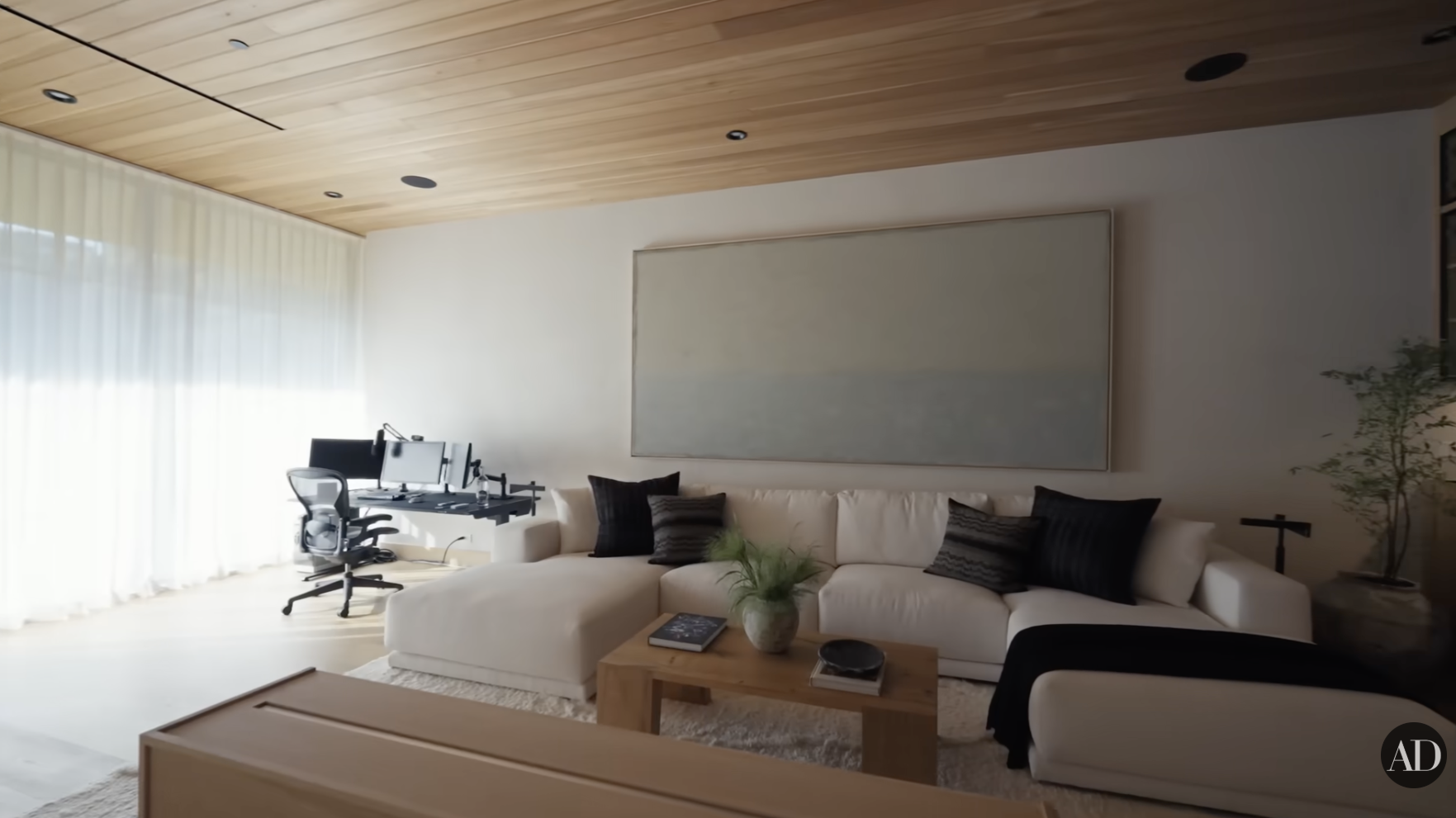 Zedd's primary suite living area posted by Architectural Digest on November 8, 2025. | Source: YouTube/Architectural Digest