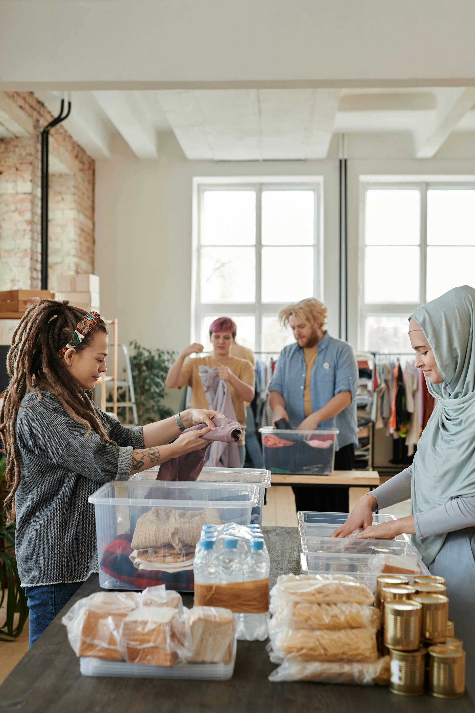 People sorting donations | Source: Pexels